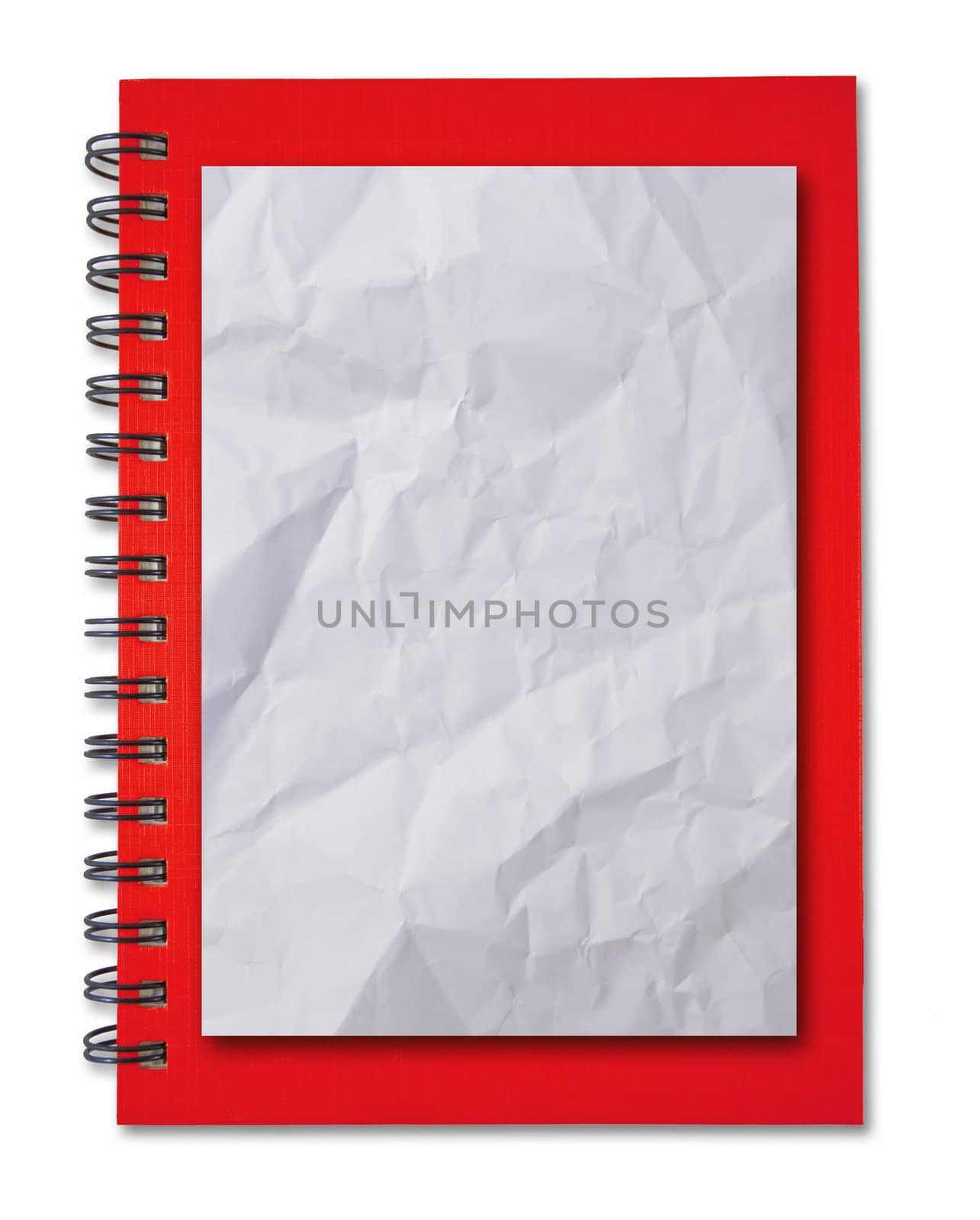 Crumpled paper on red notebook