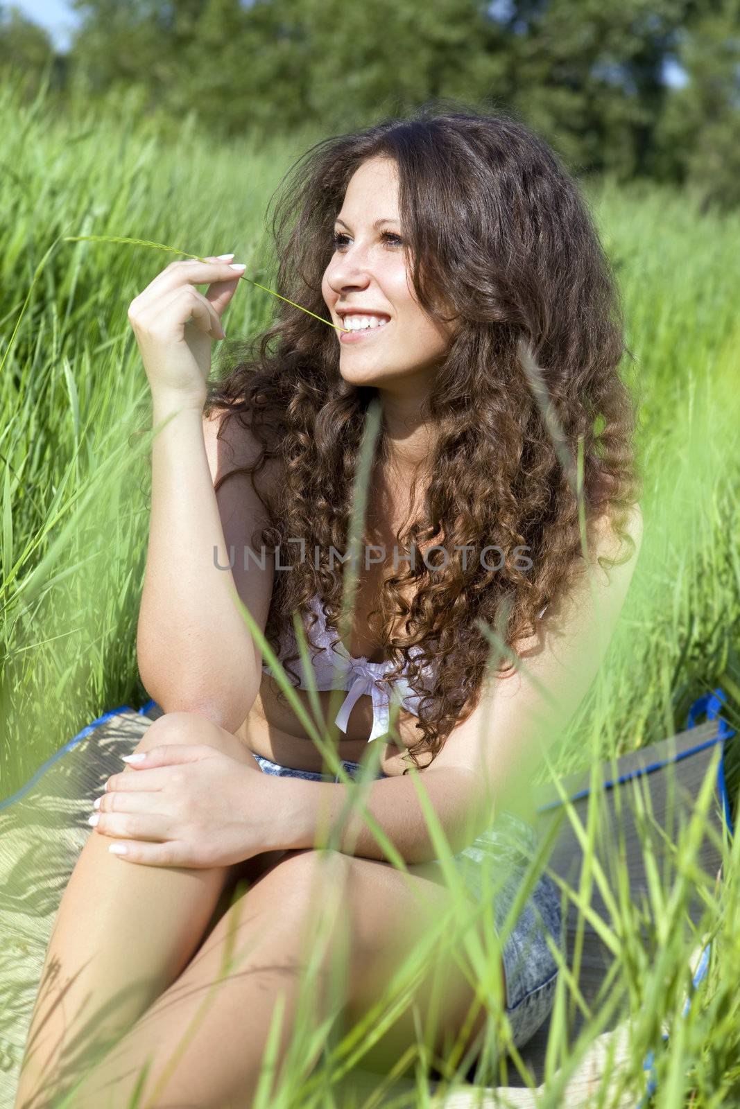 woman in green grass by ssuaphoto