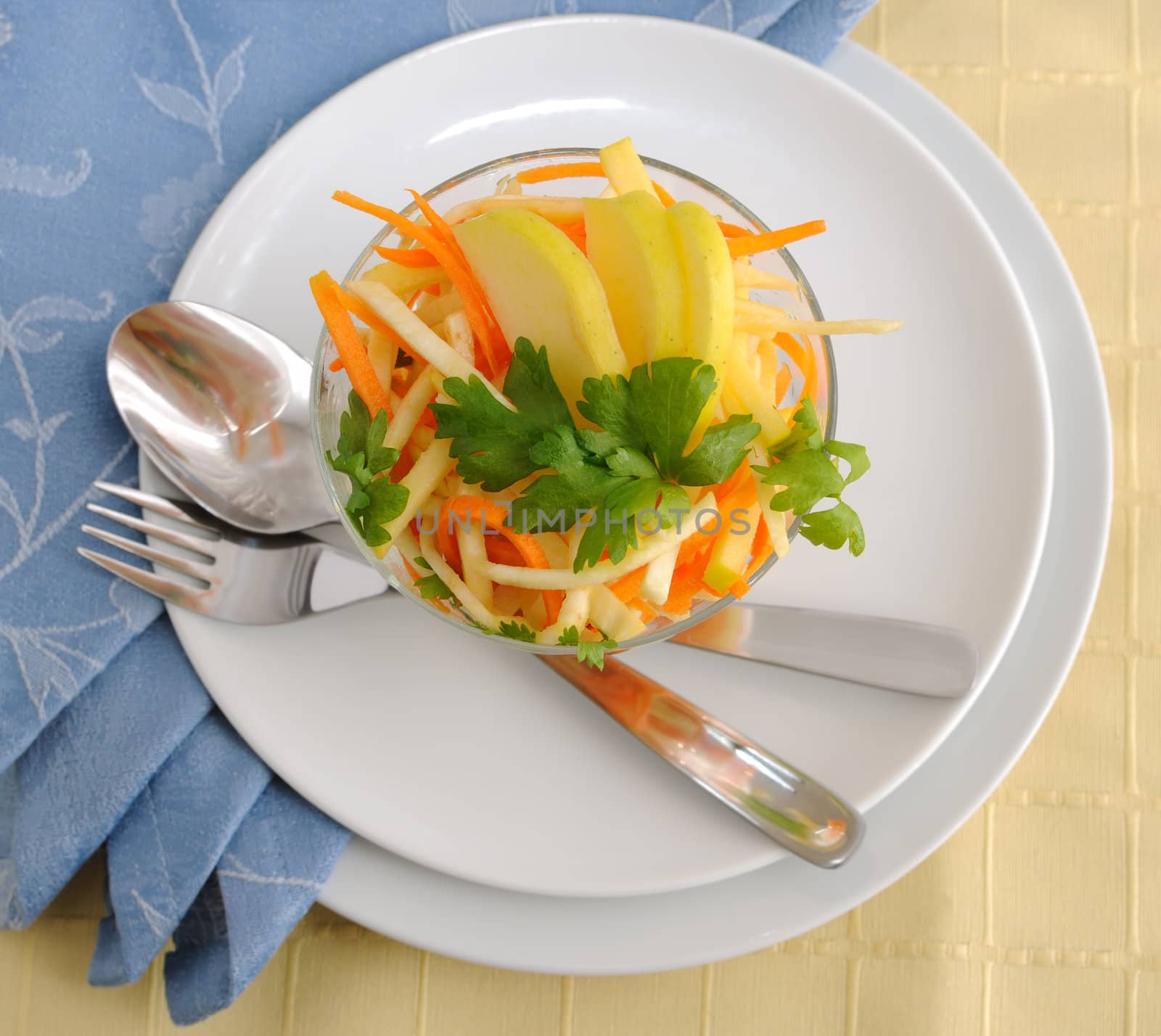 Salad of celery root and leaves with carrots, apples and shrimp