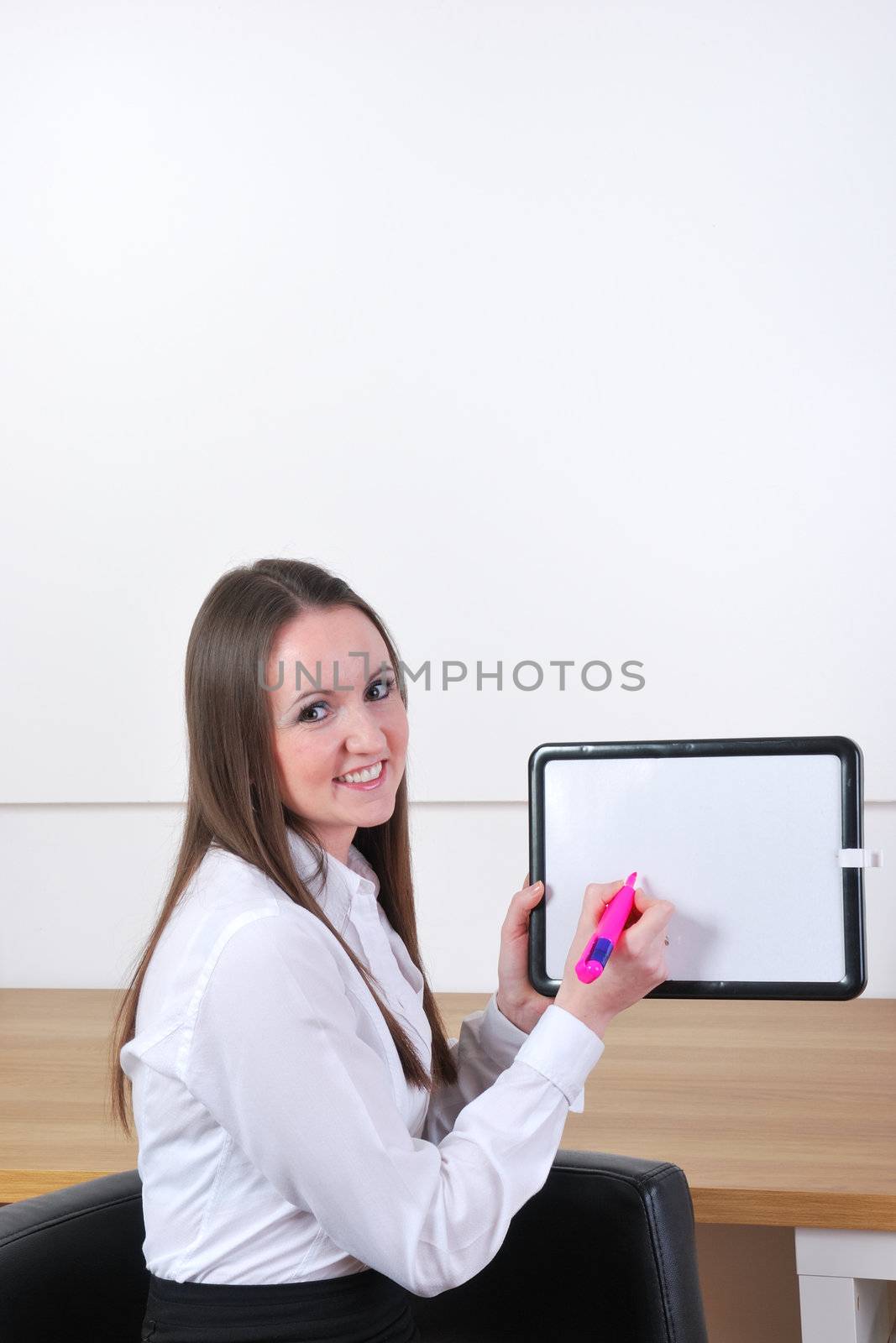 woman with sign and pink pen