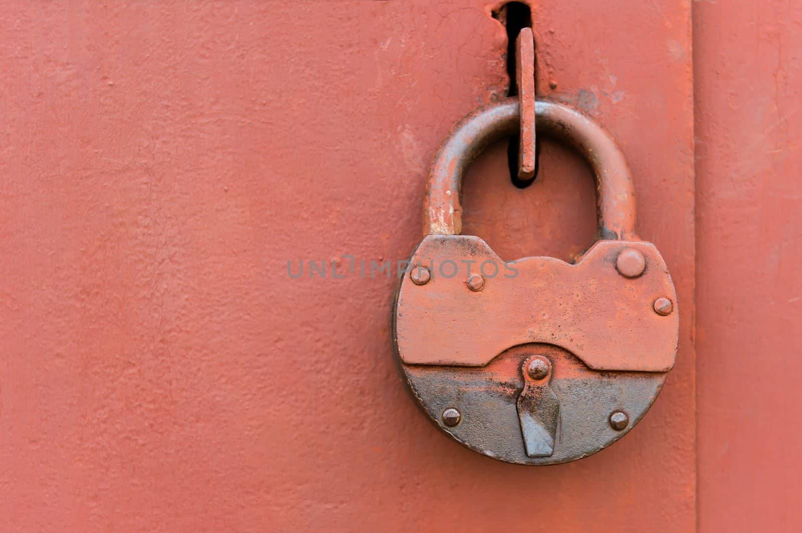 Old lock on metal door by iryna_rasko