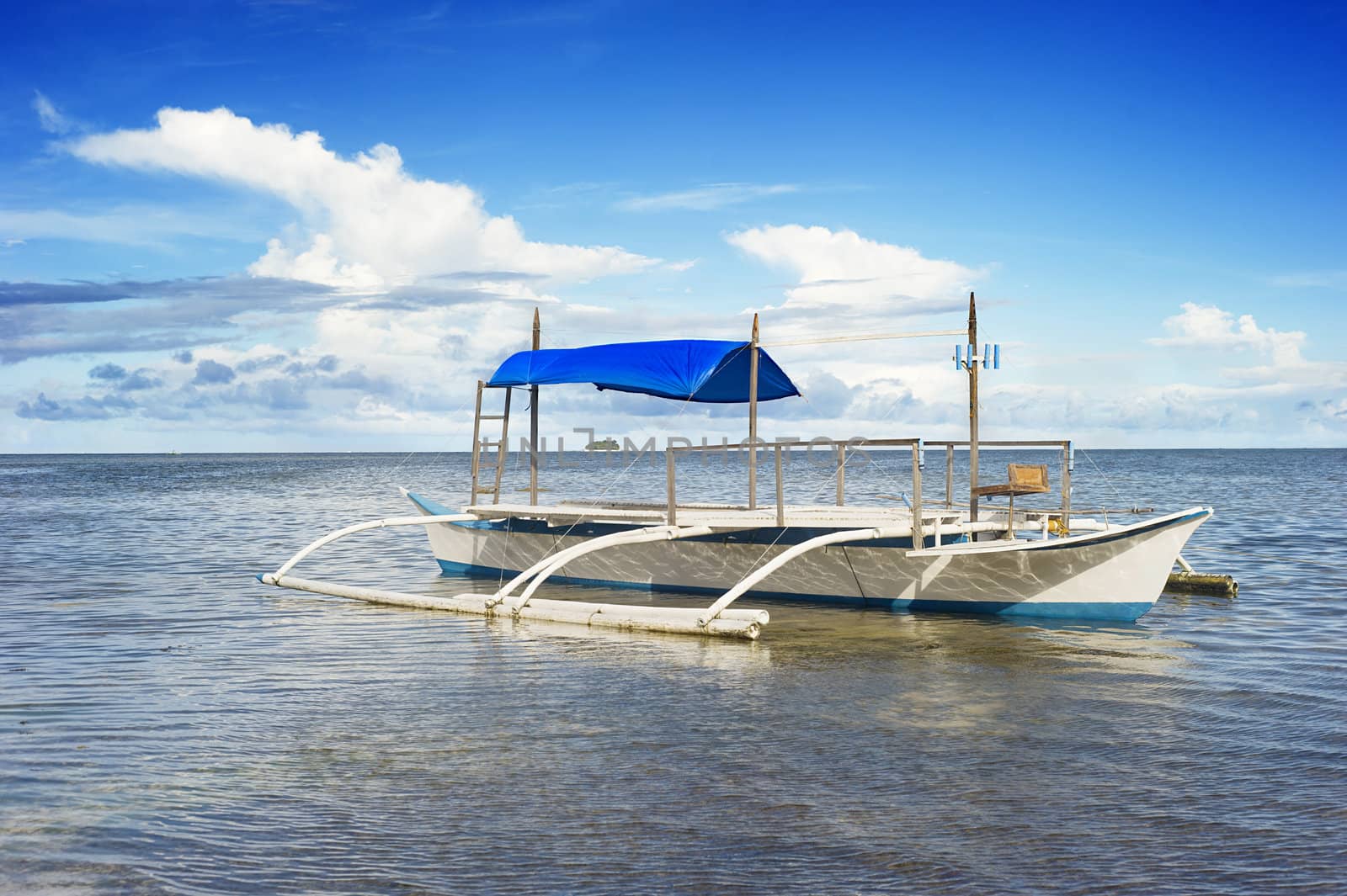 Tropical landscape with traditional Philippines boat on Shiargao island, Philippines