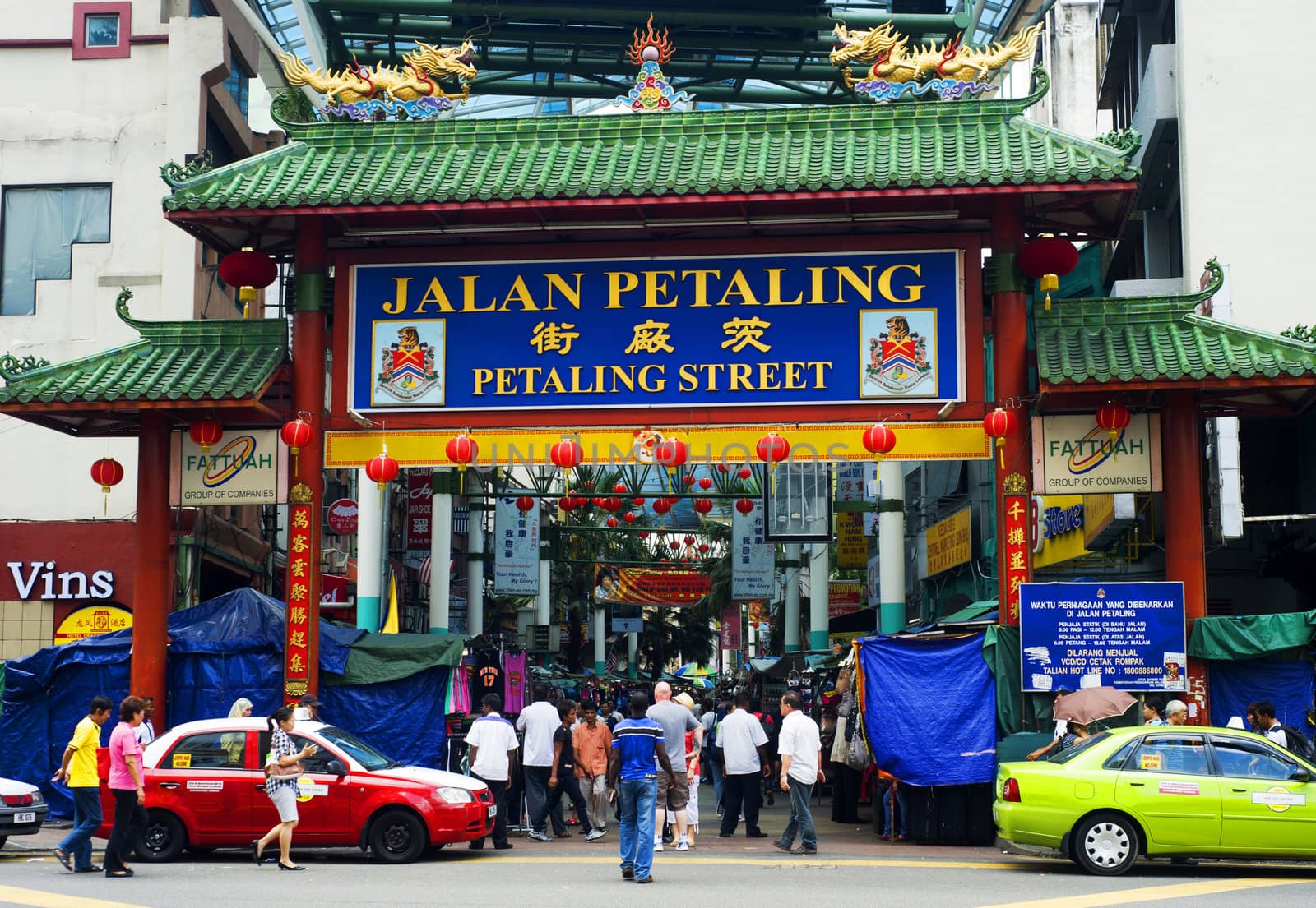 Kuala Lumpur, Malaysia - March 20, 2012: Petaling Street in Kuala Lumpur . The street is a long market which specialises in counterfeit clothes, watches and shoes. Famous tourist attraction 