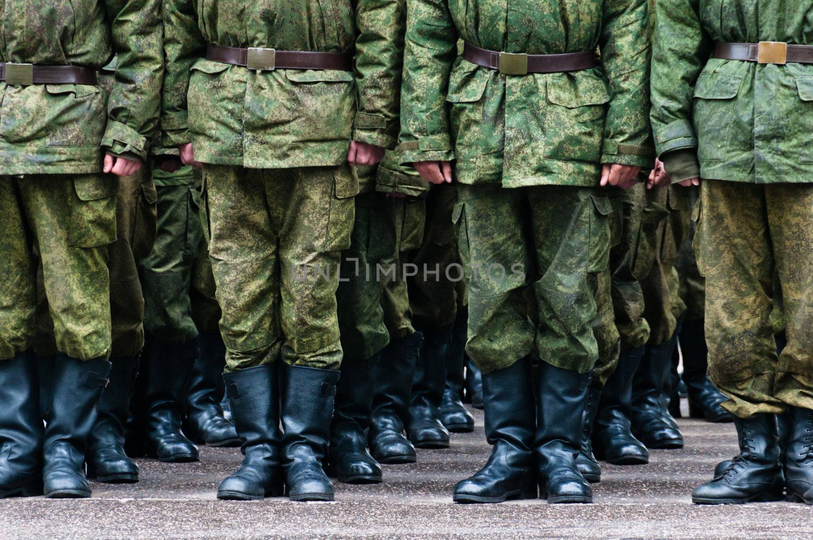 Soldiers stand in formation legs only by dmitryelagin