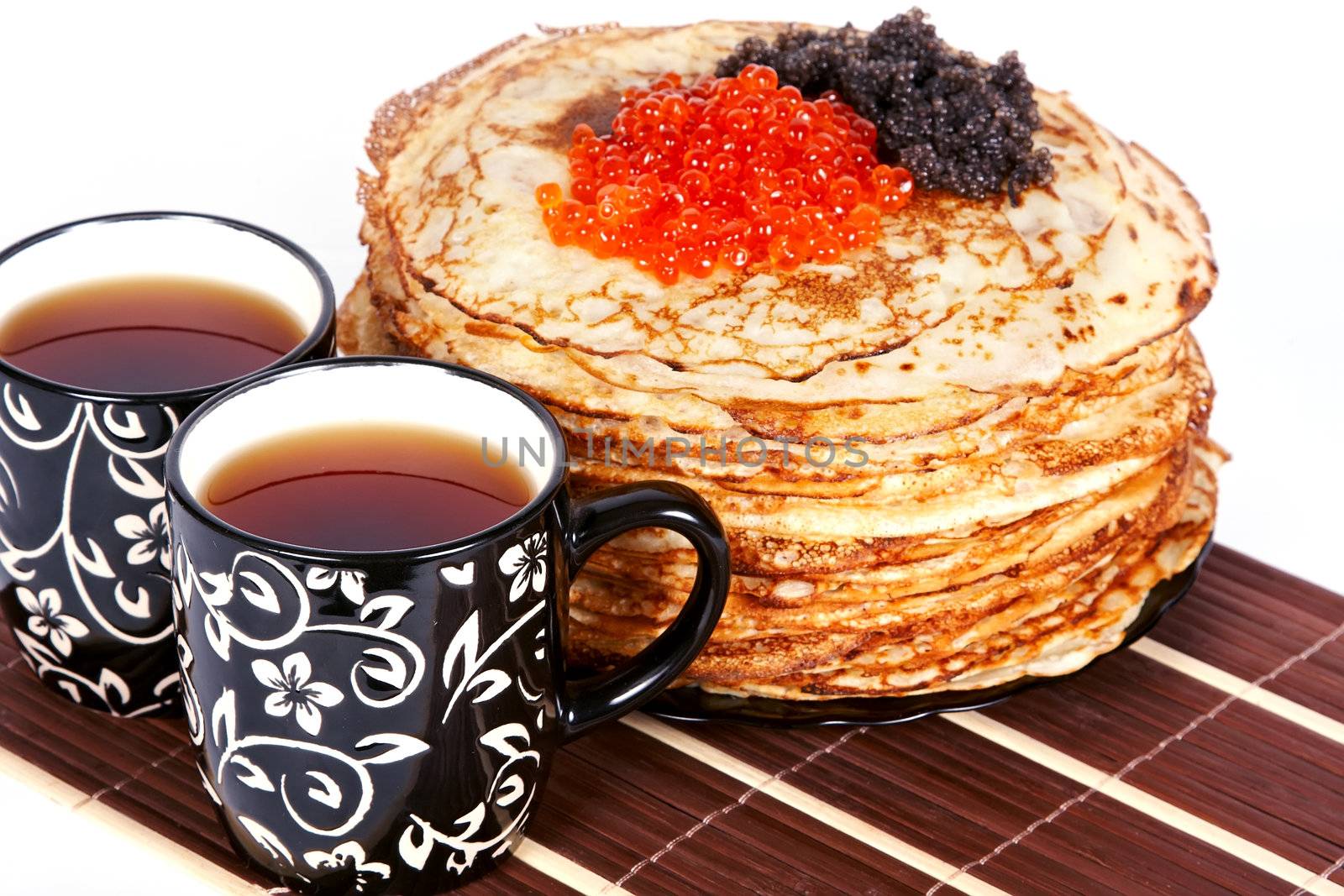 Tea and a pancakes with caviar by Azaliya