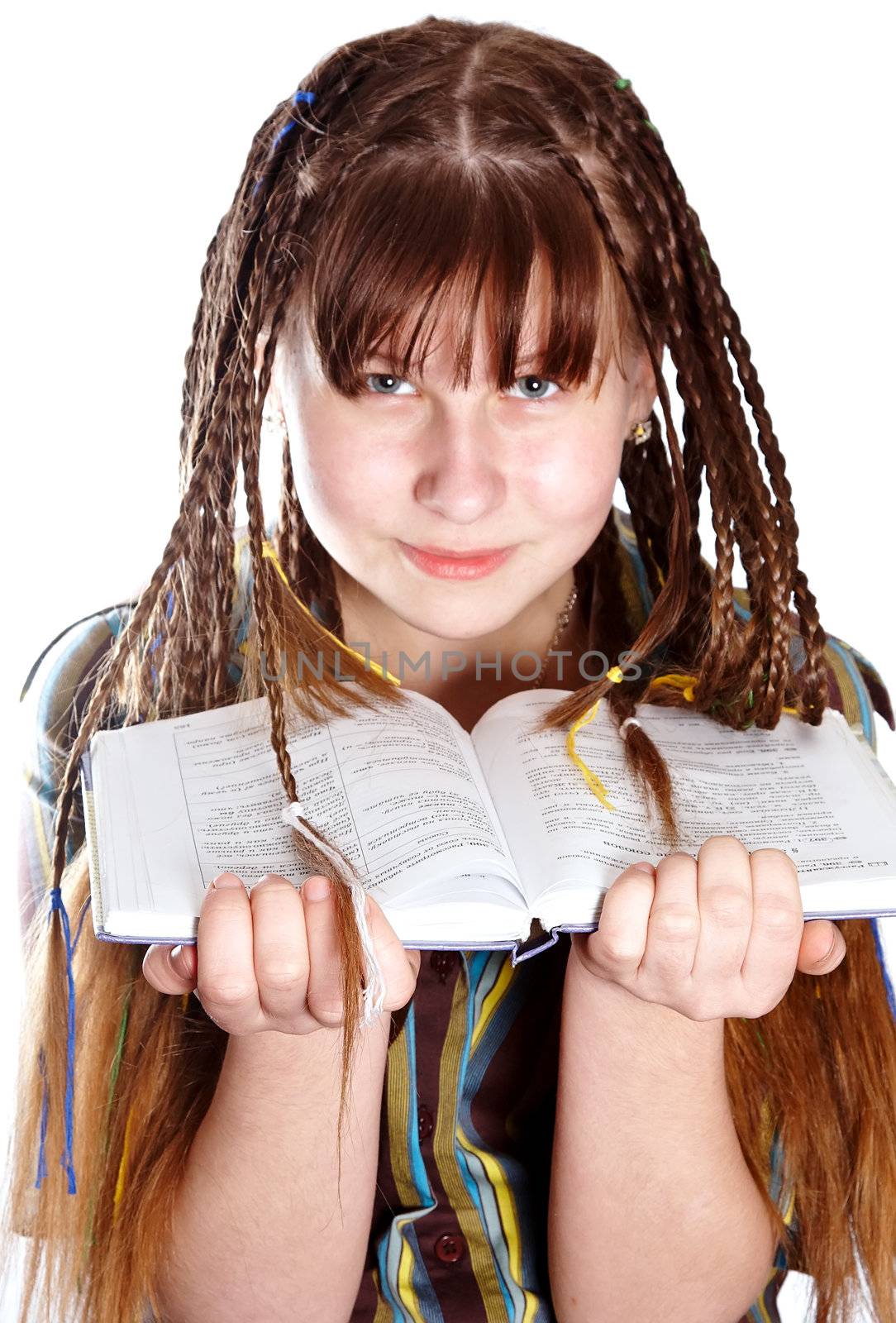 The teenage girl with plaits and the book on a white background