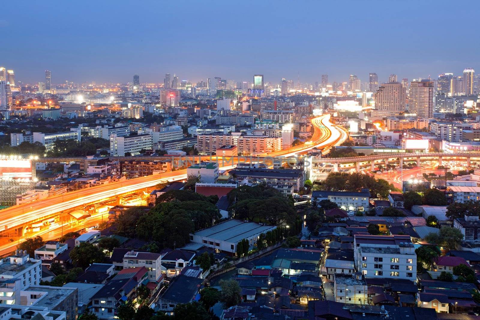 Citscape of Bangkok Skylines at Victory Monument Downtown at Dusk aerial view