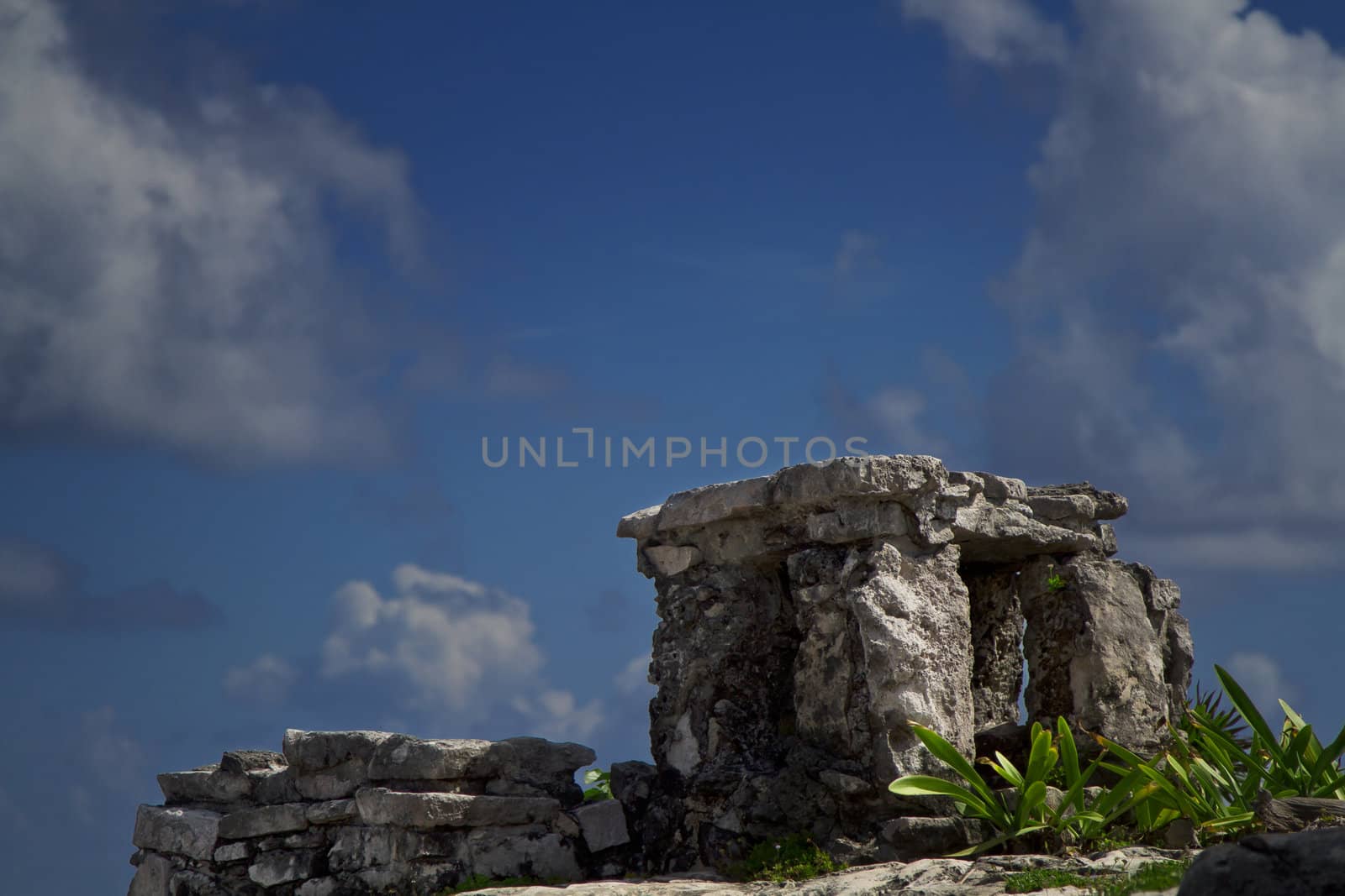 Close up view of a mayan altar with blue sky