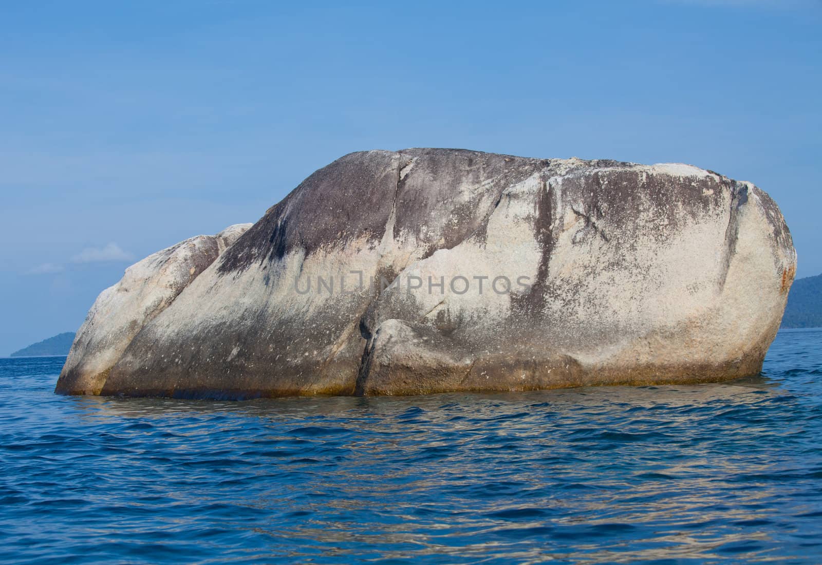 Beautiful tropical beach with big stones. Thailand