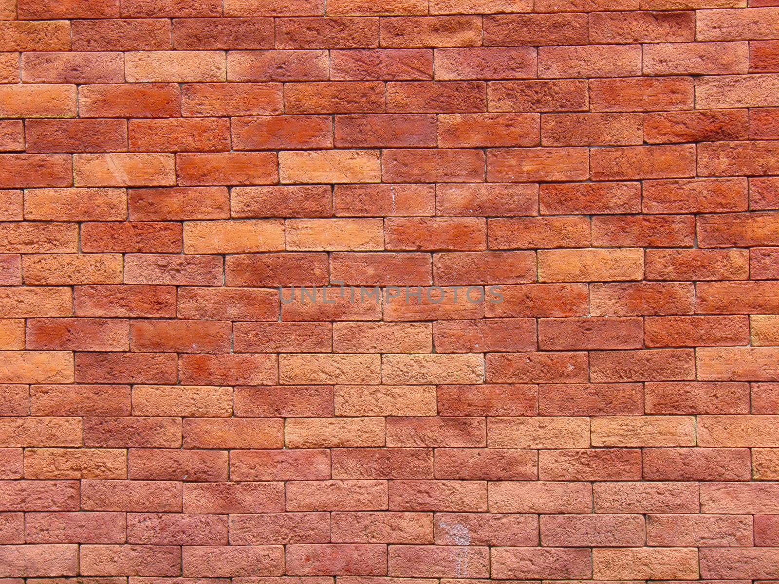 Brick wall from a new house by jconejo