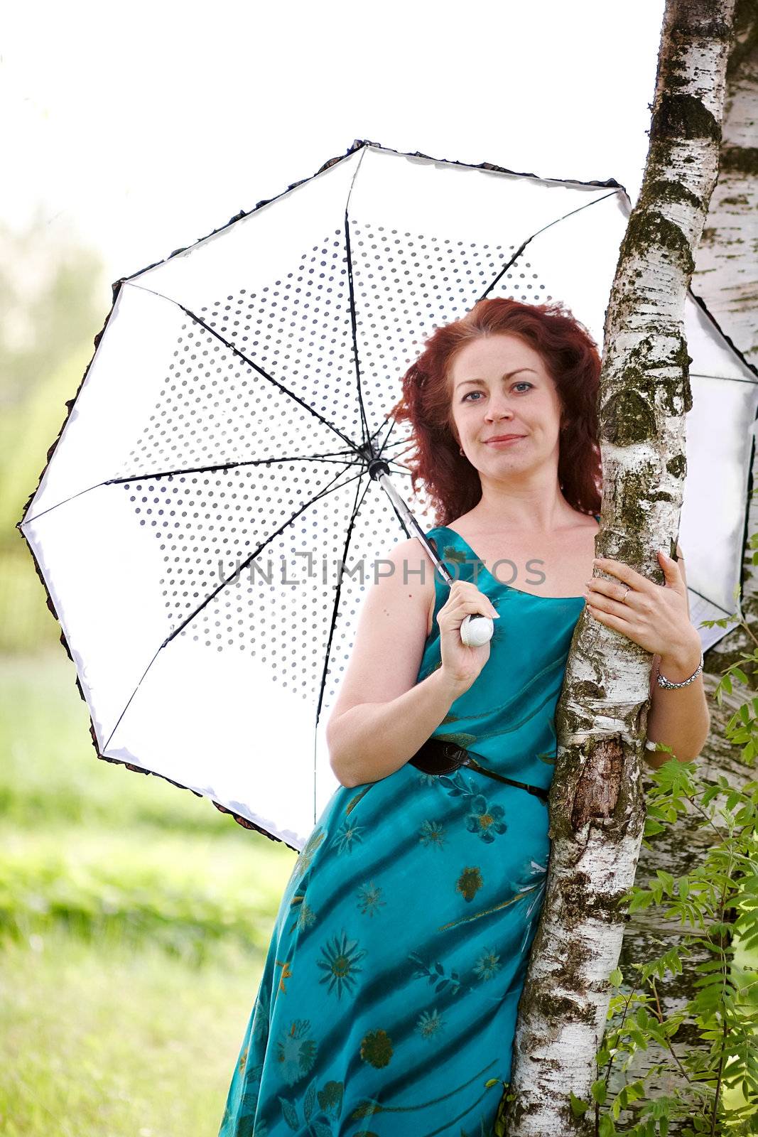 Woman with an umbrella by Azaliya