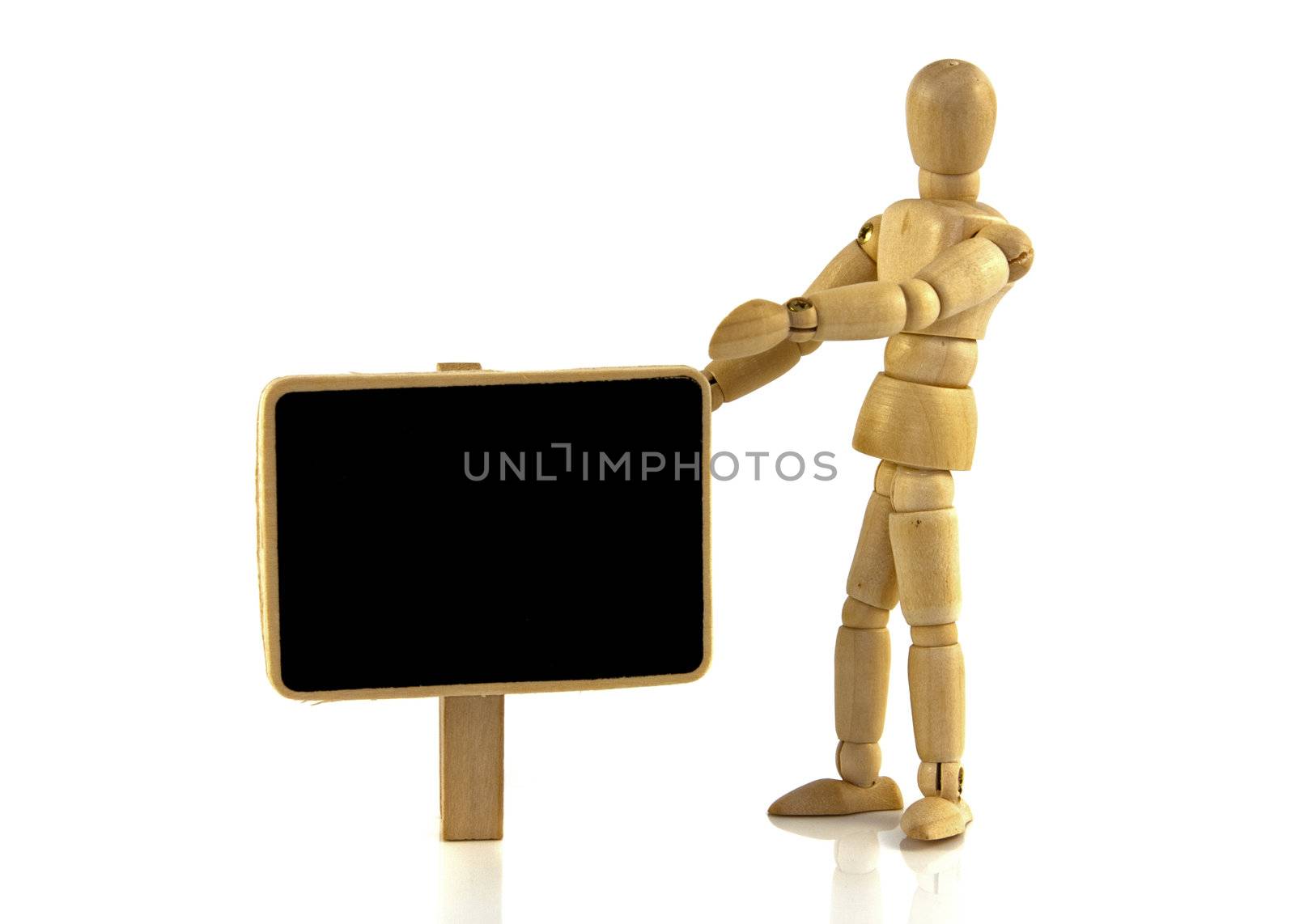 wooden puppet with blackboard by compuinfoto