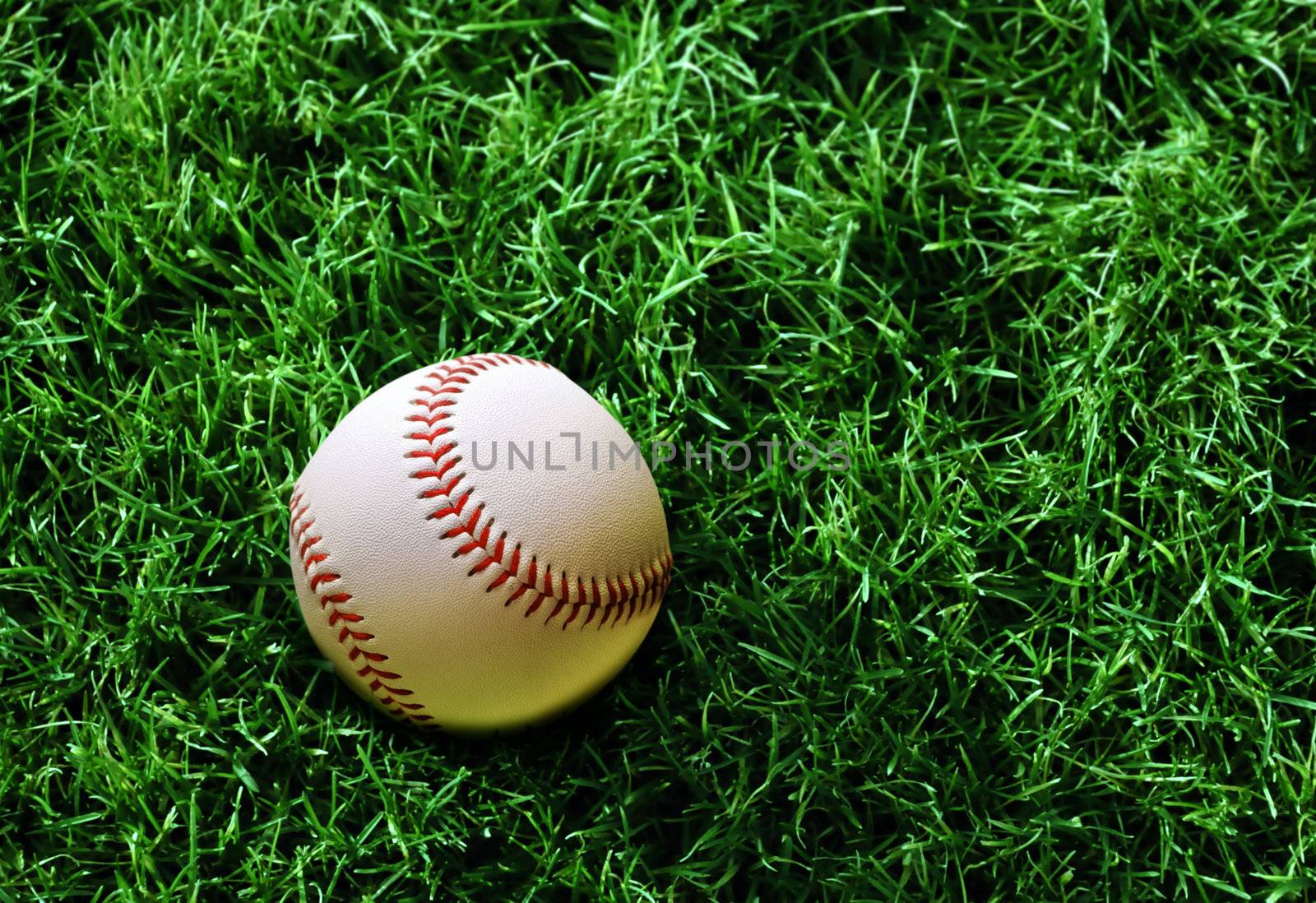 baseball on grass by ssuaphoto