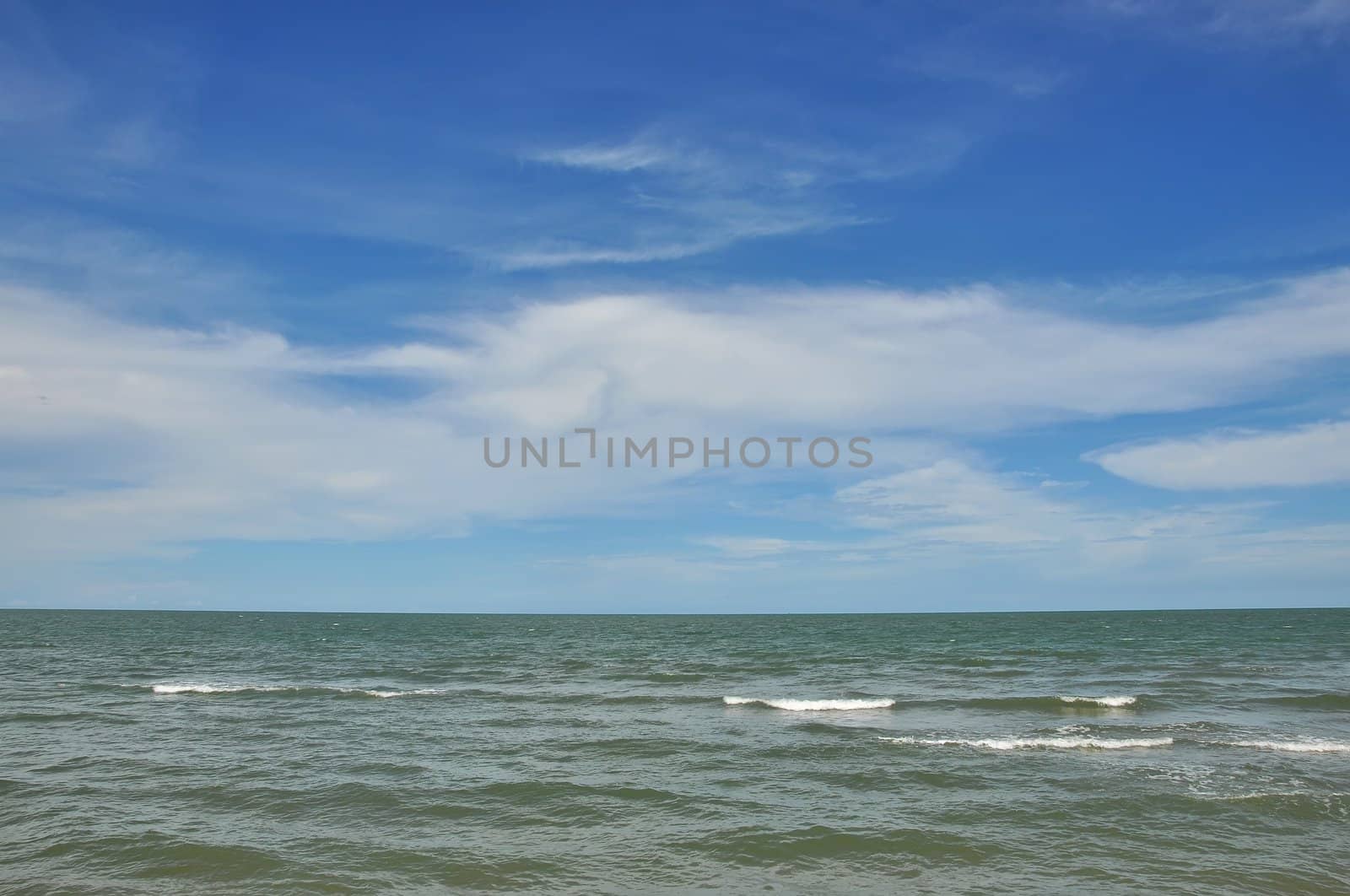 Empty beach with sun