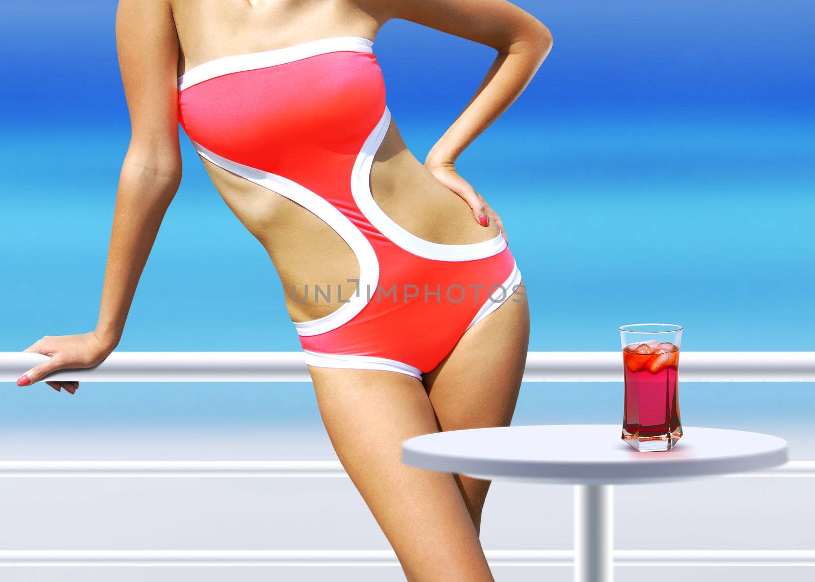 part of woman with cocktail near swimming pool