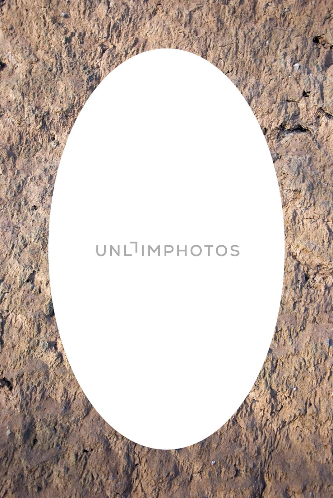 White oval photo frame on clay wall background by sauletas