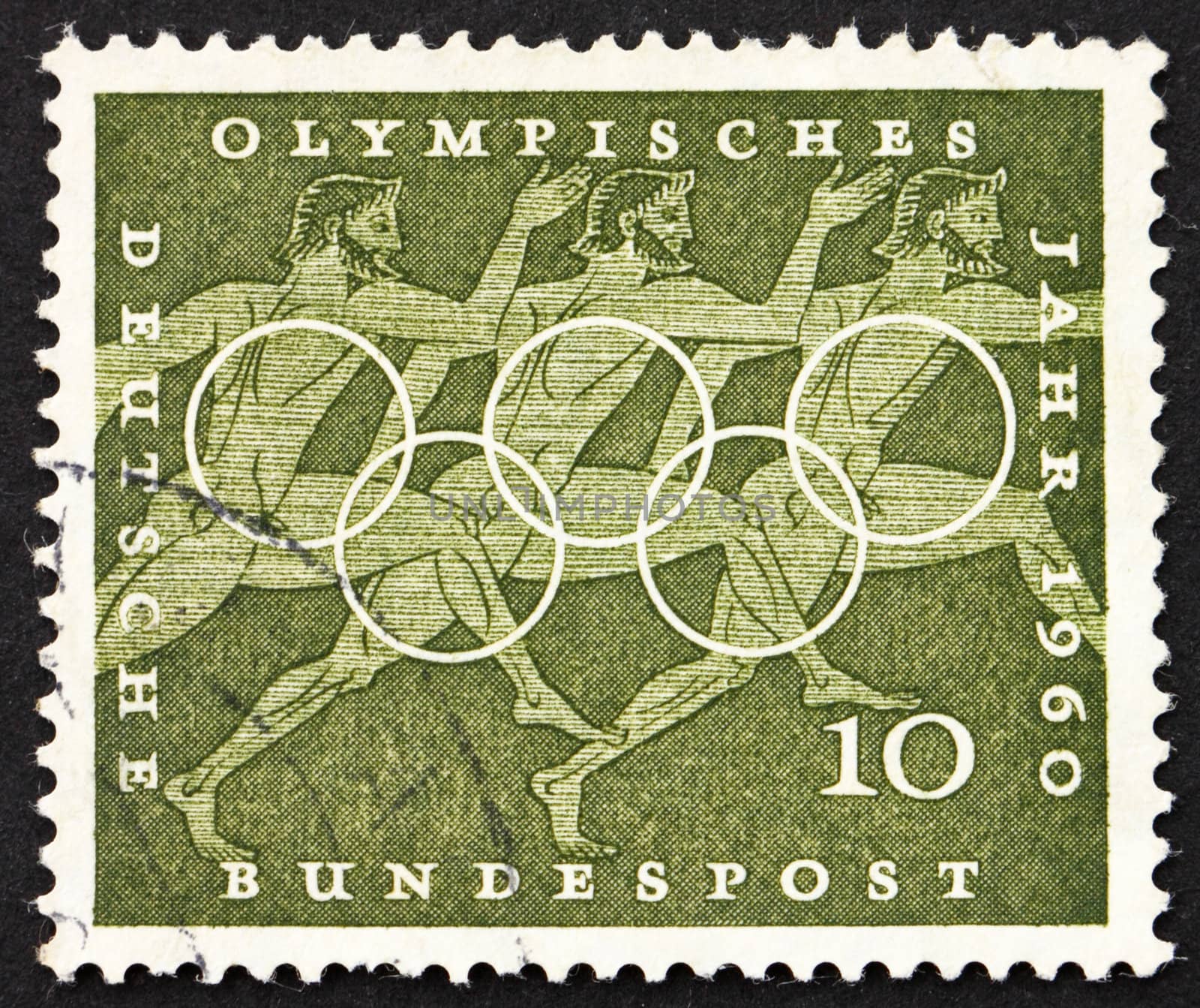 GERMANY - CIRCA 1960: a stamp printed in the Germany shows Sprinters, Sport Scene from Greek Urn, 17th Olympic Games, Rome, circa 1960