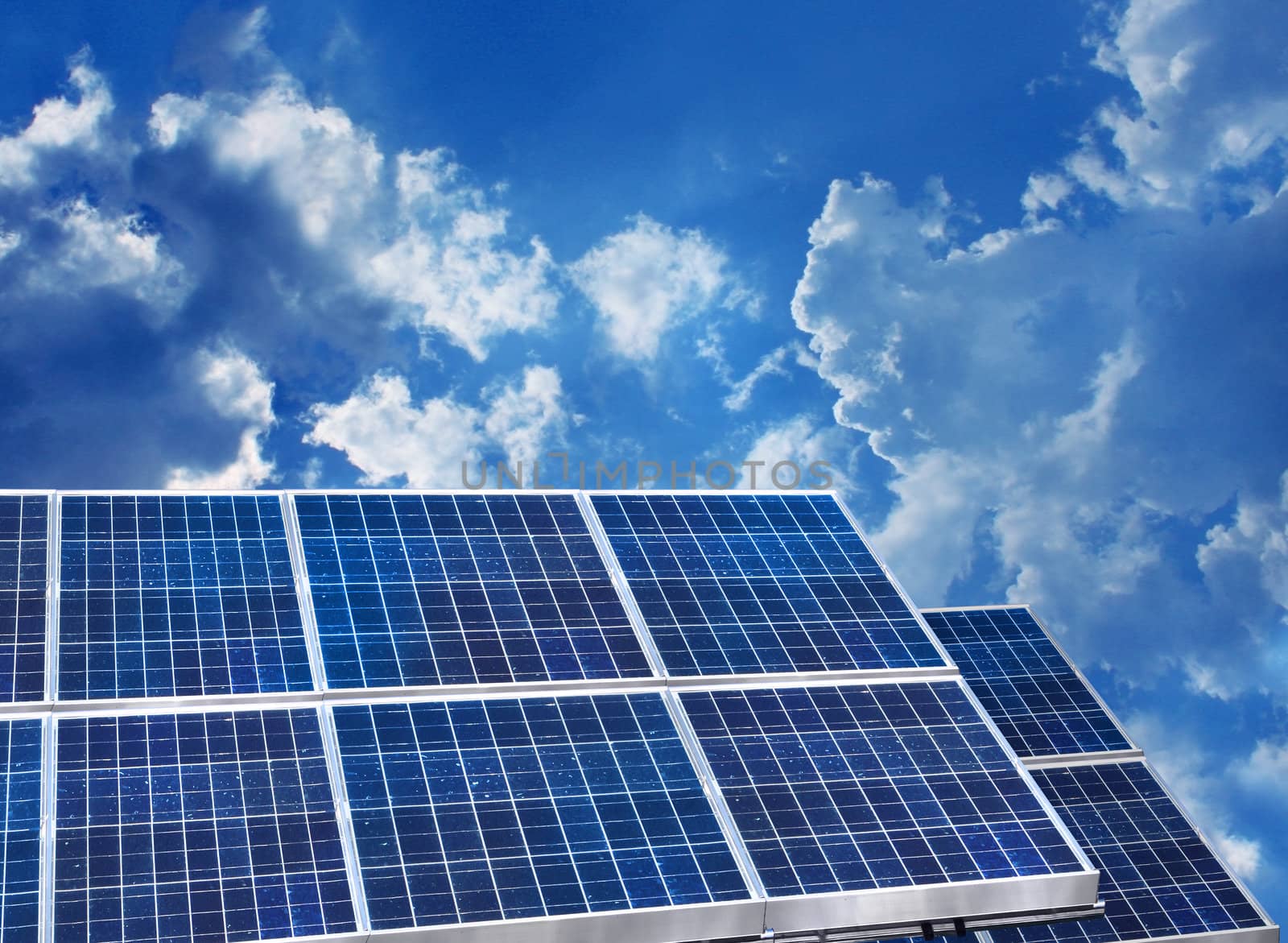 Solar panels blue sky by anterovium