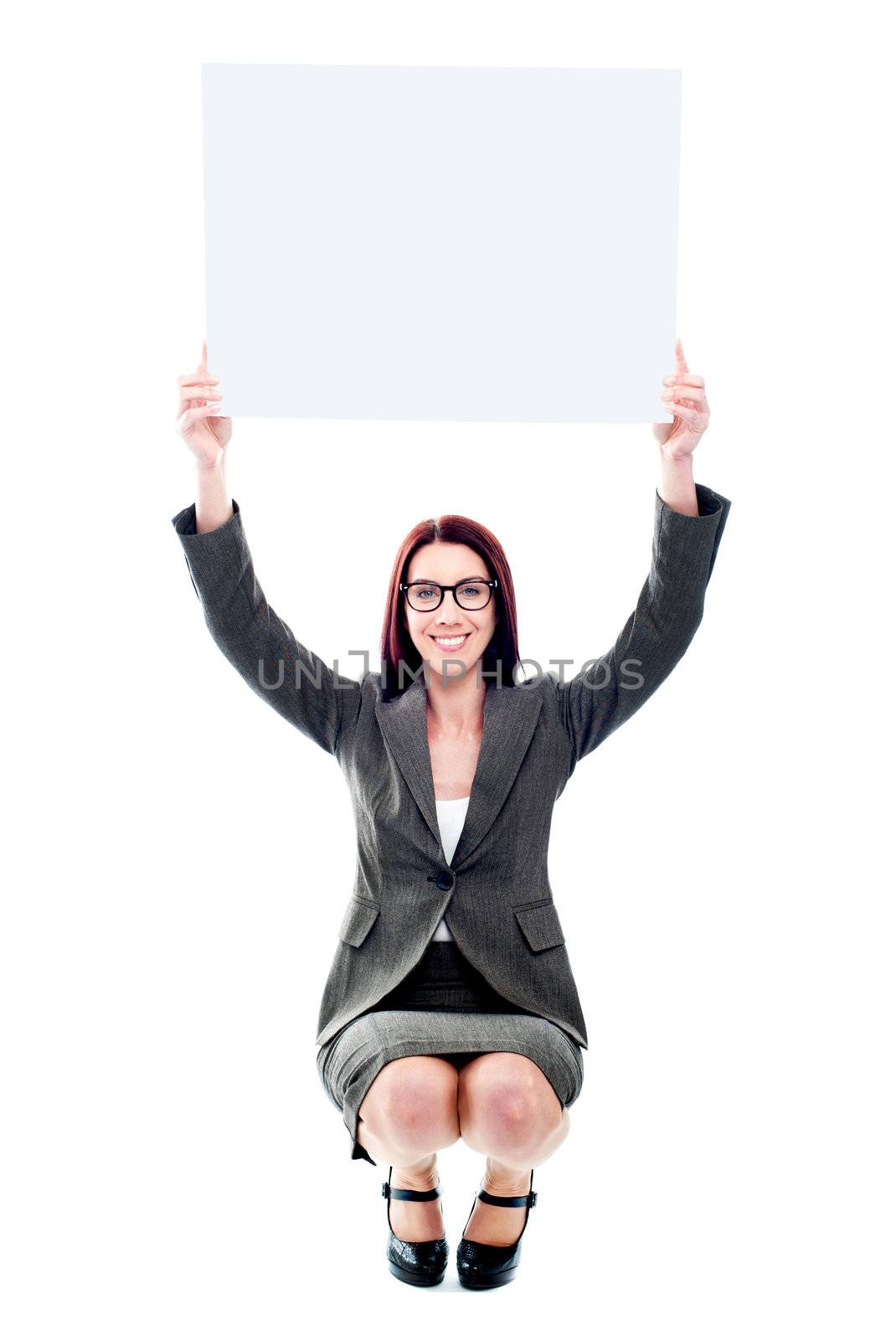 Seated corporate lady showing billboard over her head
