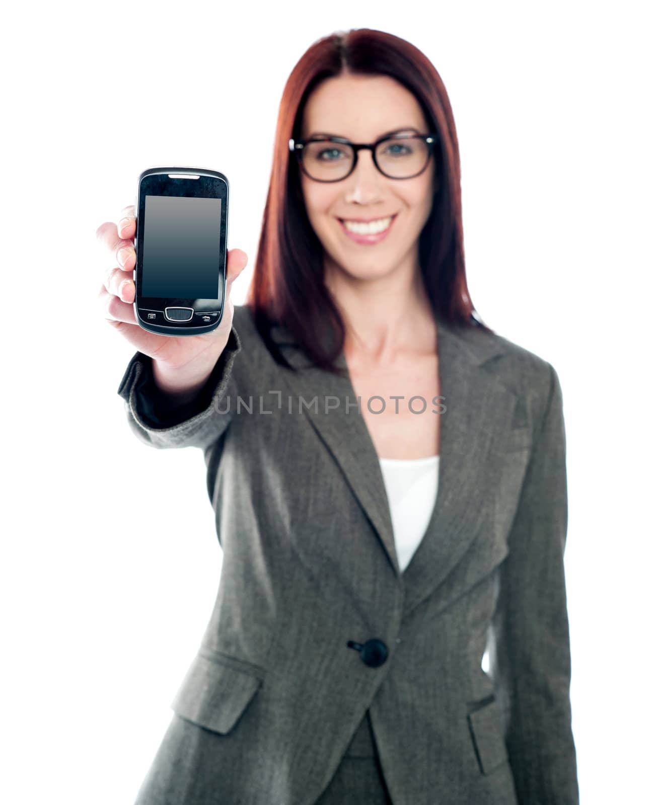 Saleswoman displaying latest mobile handset. Touch screen technology