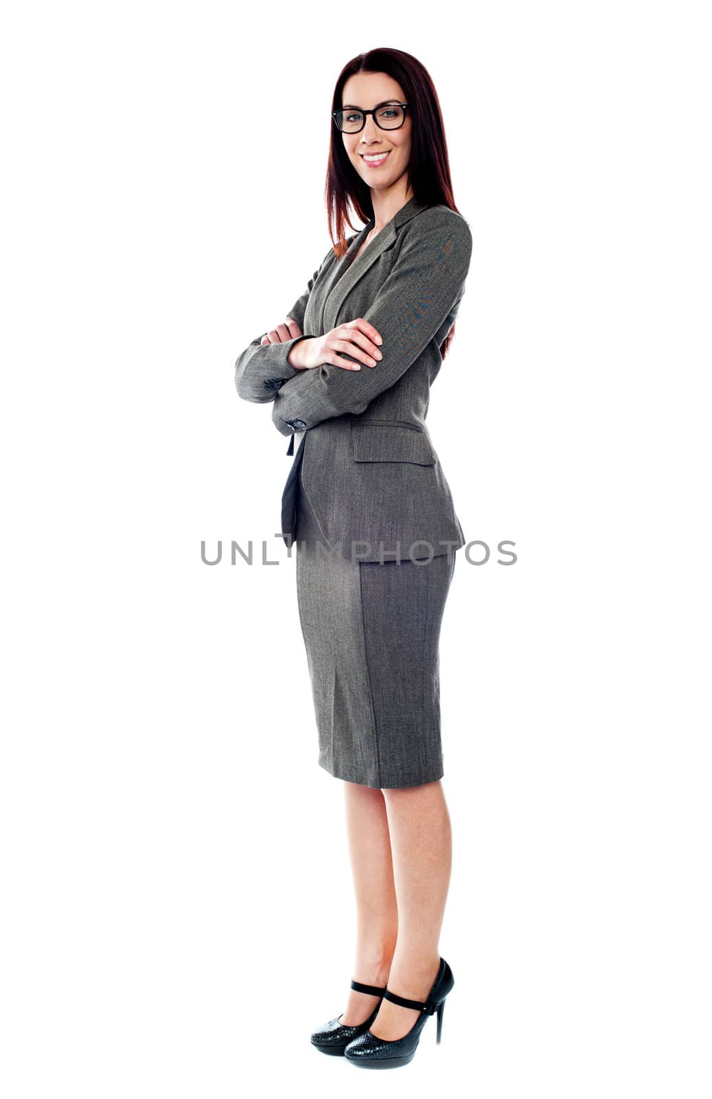 Beautiful sucessful businesswoman with folded arms isolated on white background