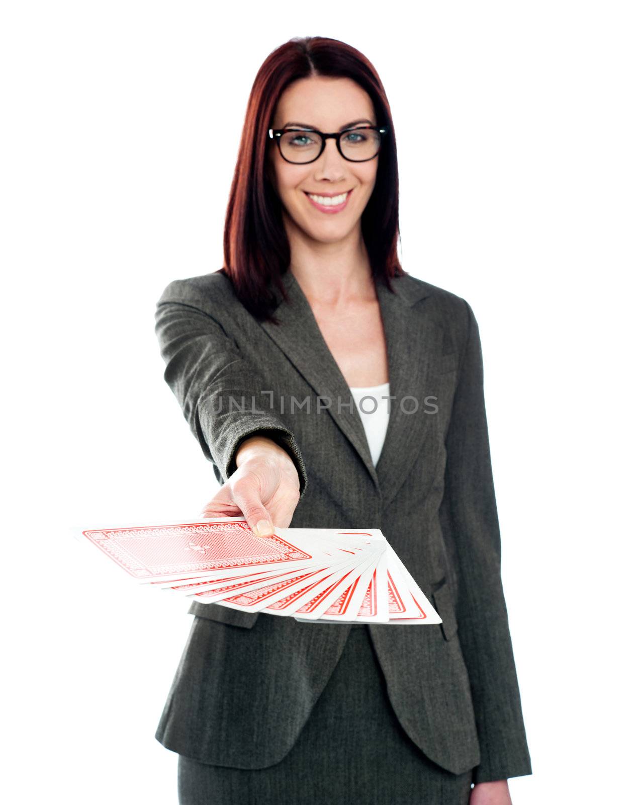 Smiling womans with playing card wearing spectacles