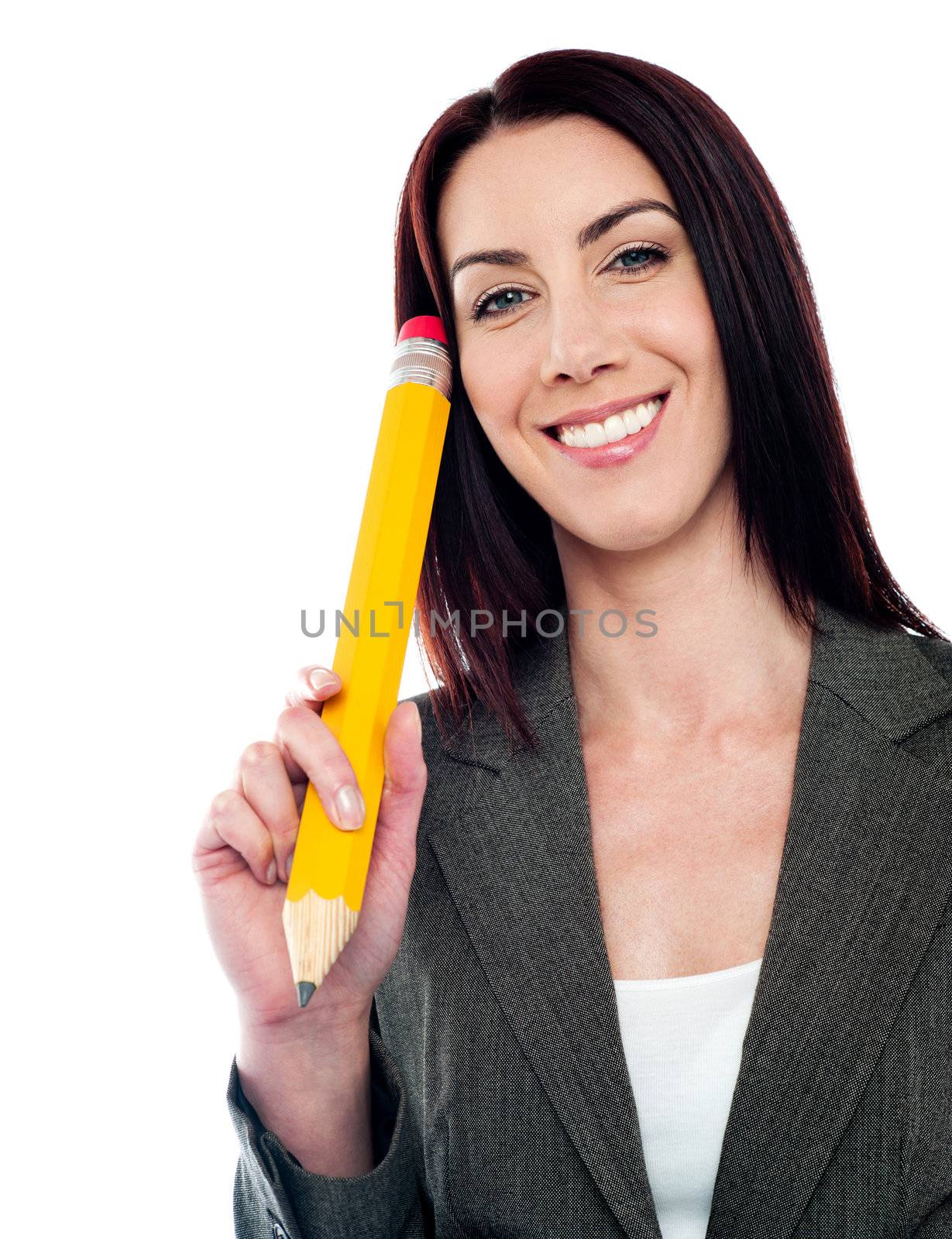 Thoughtful businesswoman holding big yellow pencil isolated against white