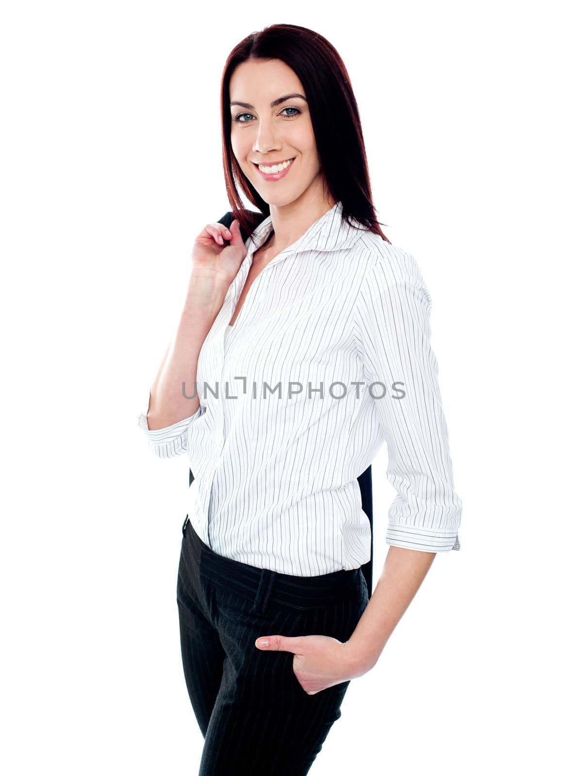 Stylish female business executive holding coat over her shoulders on white background