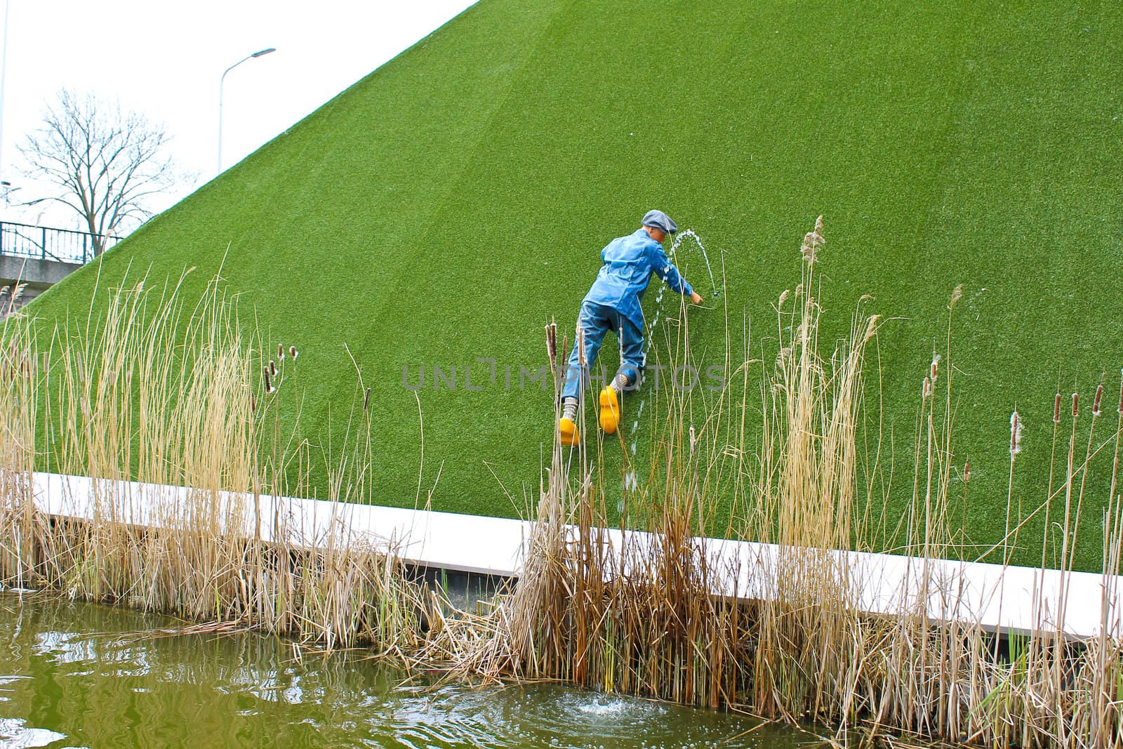 A mannequin on display in Madurodam in The Hague. Worker removes damaged. Den Haag, The Netherlands