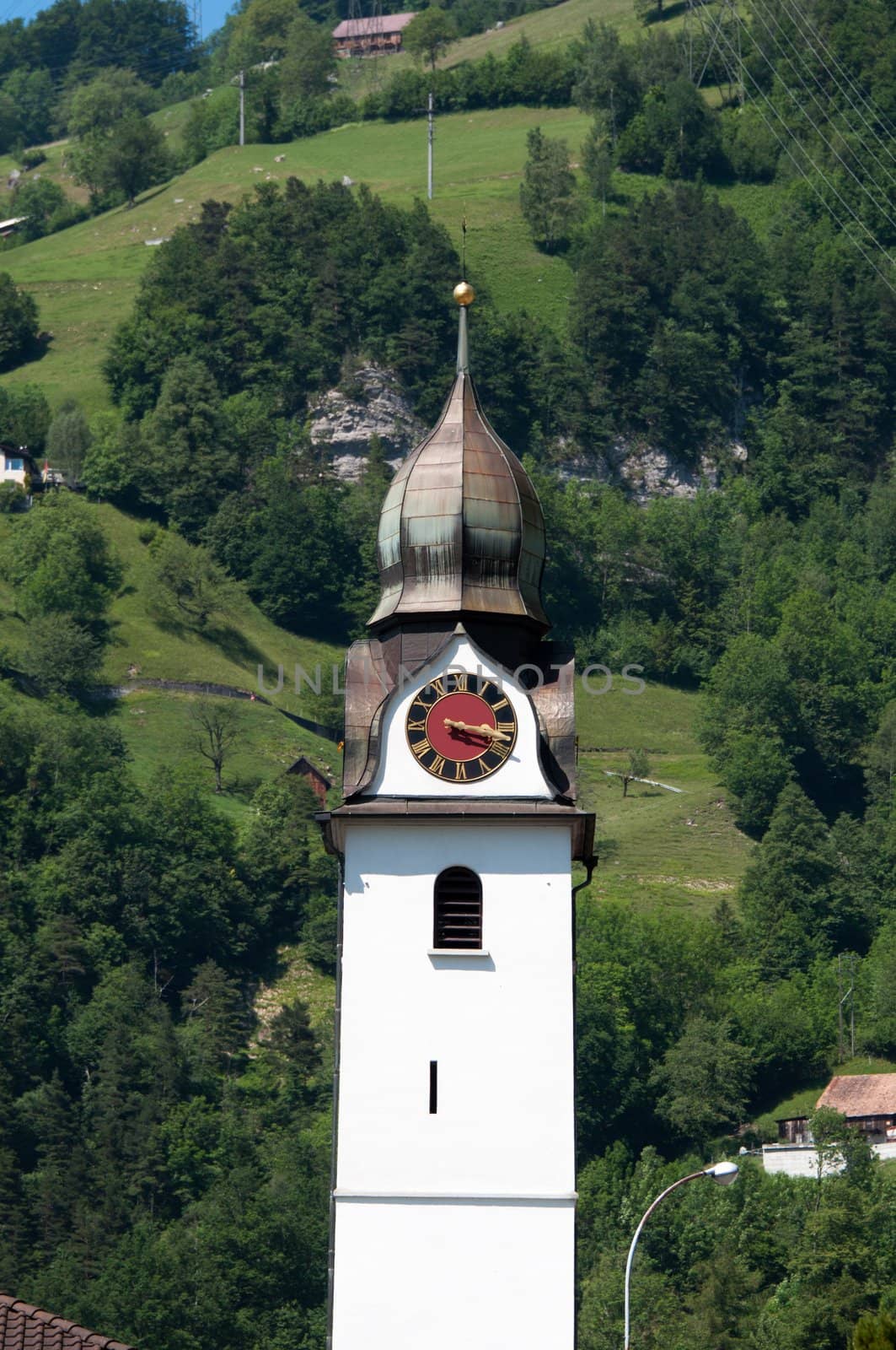 beautiful church in alpine landscape at Sisikon, Lake Luzerne, Switzerland