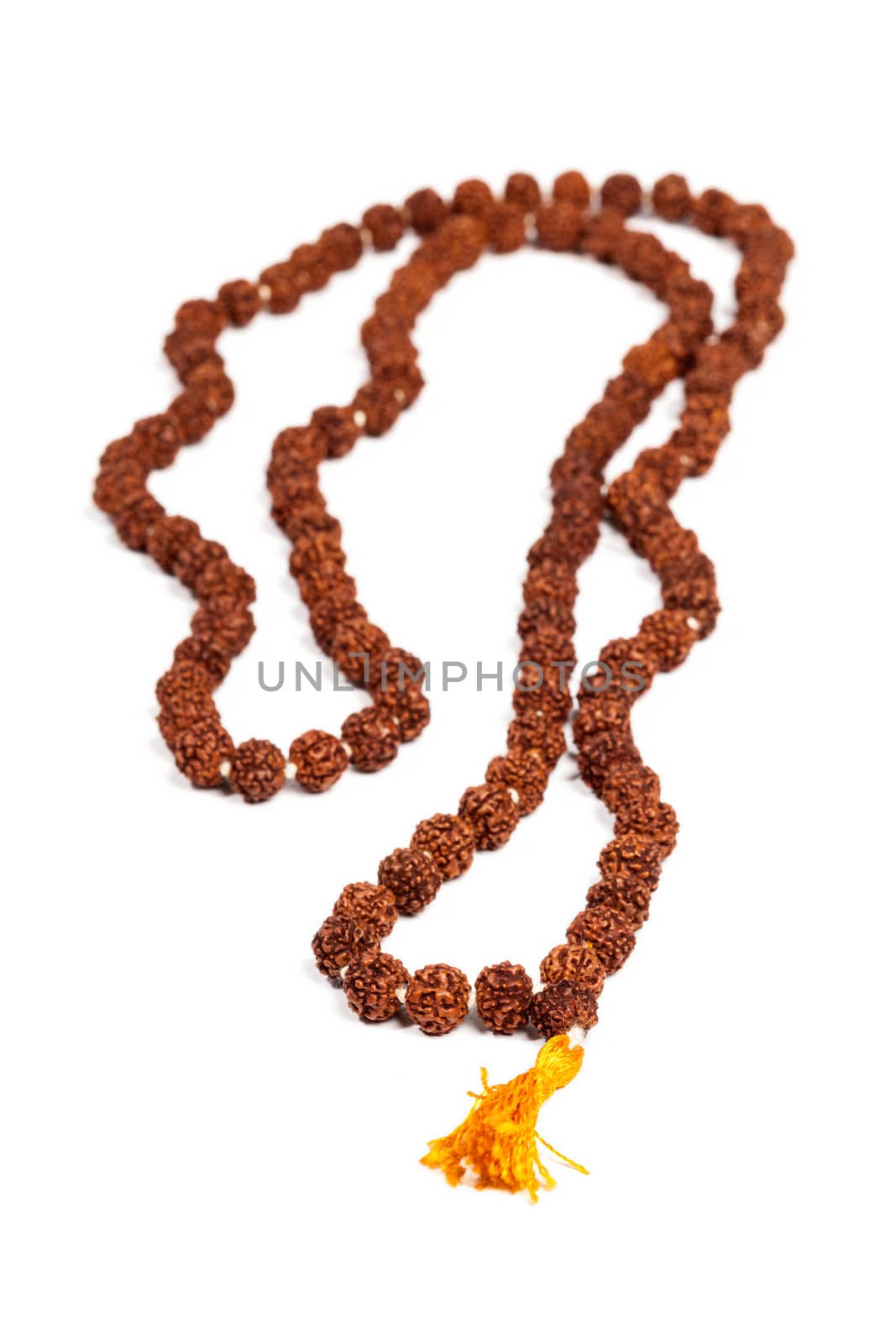 Buddhist or Hinduist Japa mala (prayer beads) made of rudraksha isolated