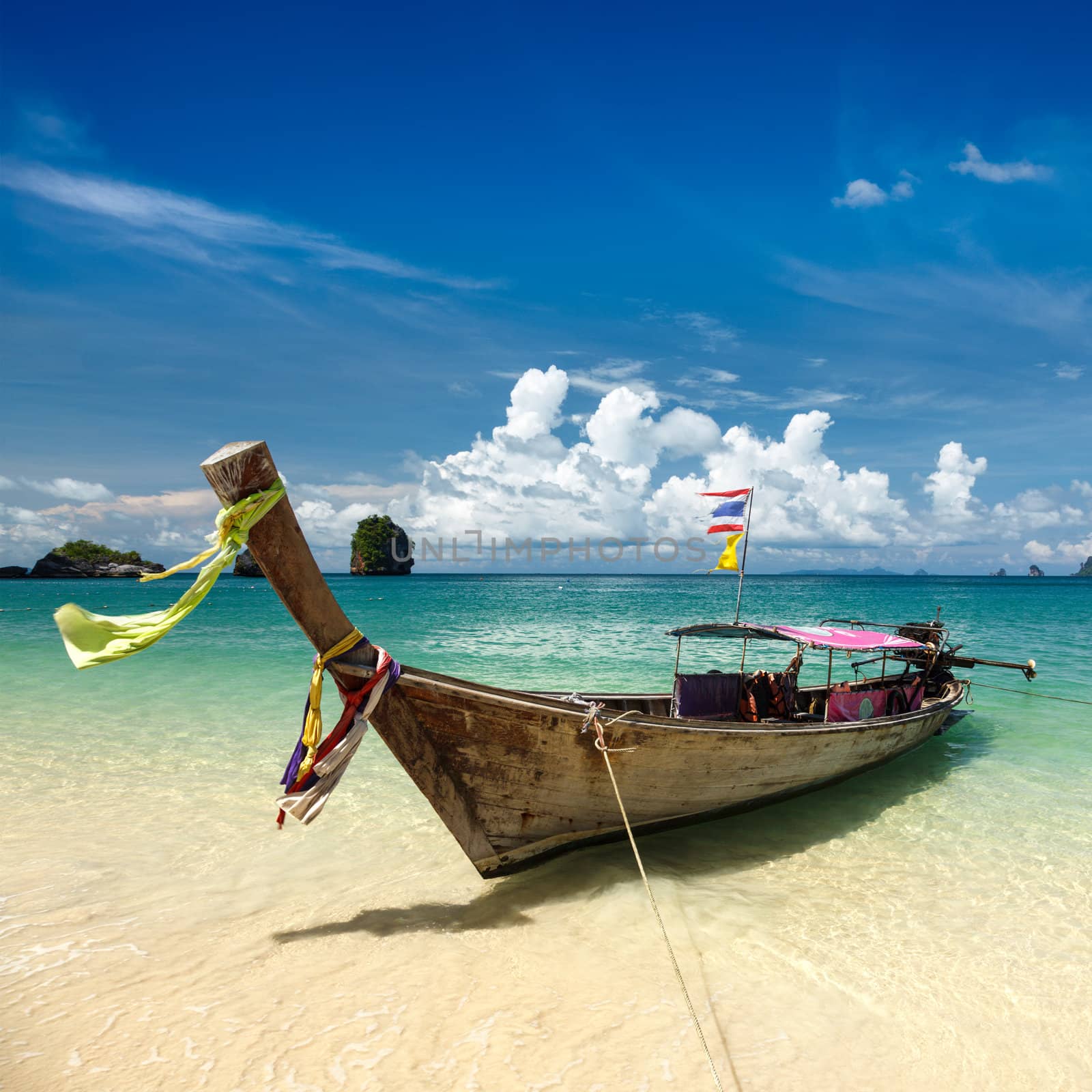 Long tail boat on beach, Thailand by dimol
