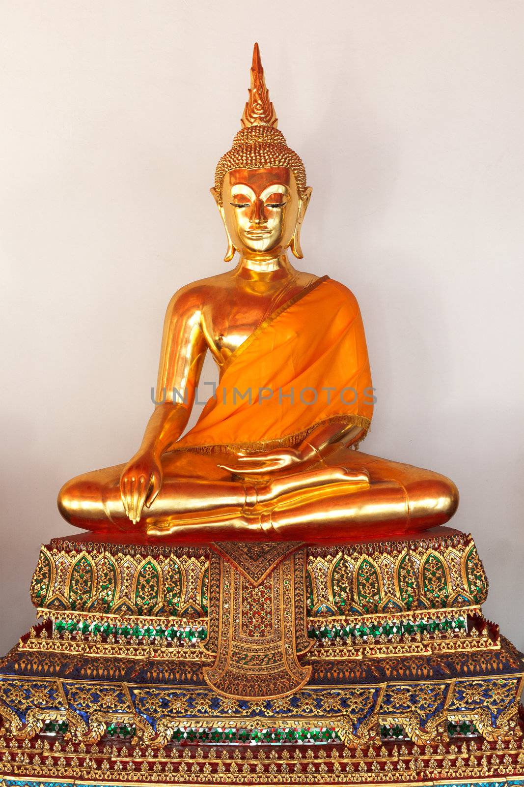 Sitting Buddha Gold Statue close up in Buddhist Temple. Wat Pho, Bangkok, Thailand