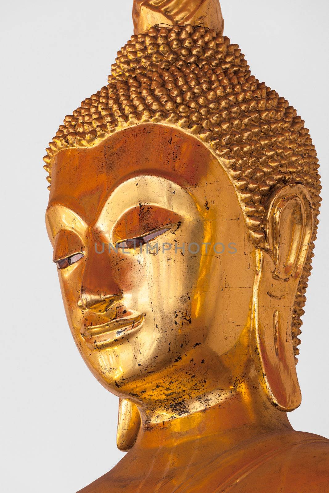 Golden Buddha Statue headclose up in Wat Pho Buddhist Temple, Bangkok, Thailand