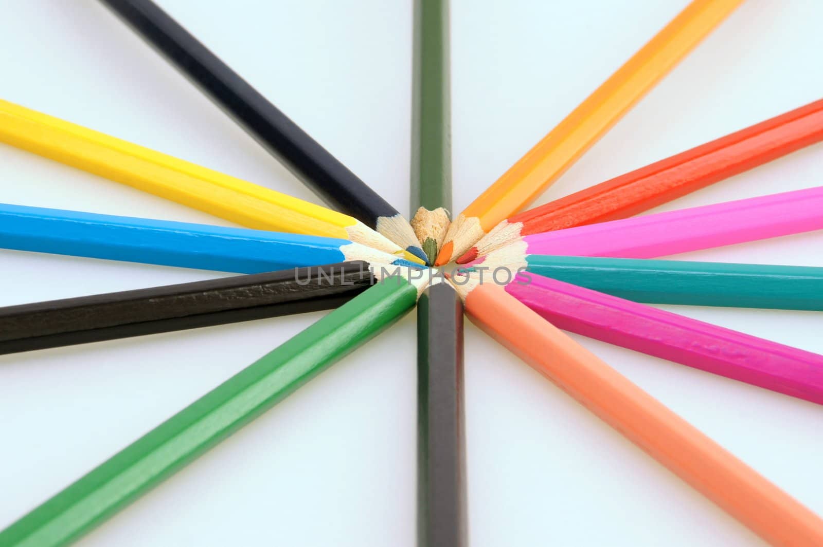 Multicolored pencils forming a star