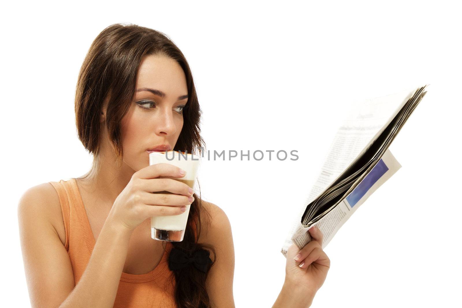 beautiful woman drinking latte macchiato coffee reading newspaper on white background