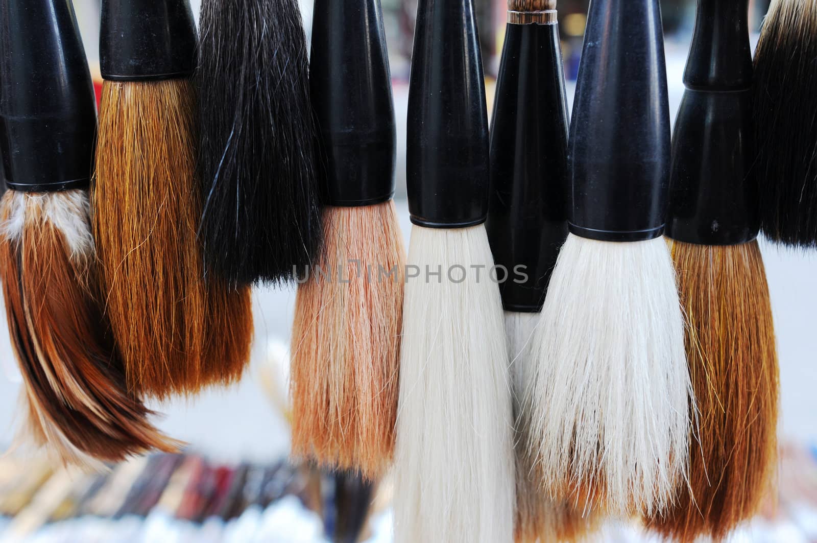 Closeup view of a bundle of Chinese brush pens for calligraphy