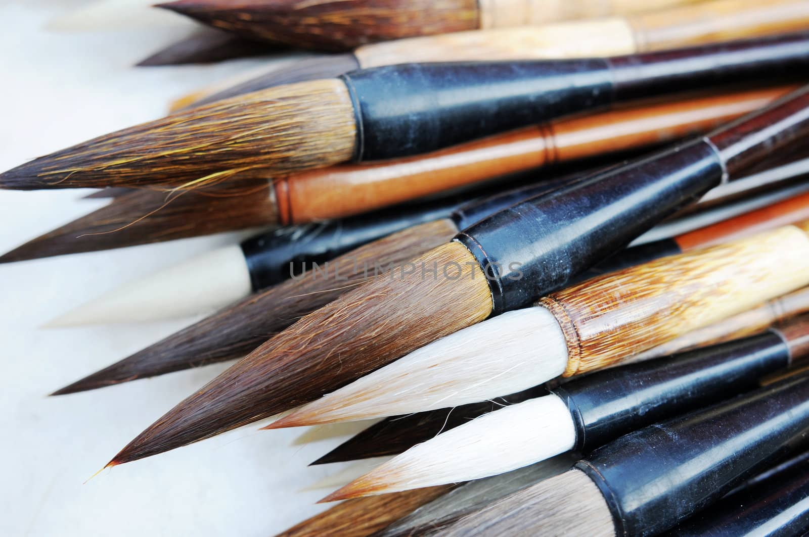 Closeup view of a bundle of Chinese brush pens for calligraphy