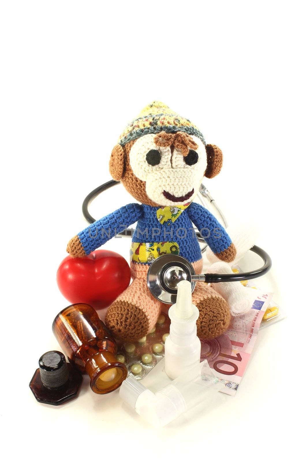 Pediatrician - with crochet monkey, money, drugs and stethoscope