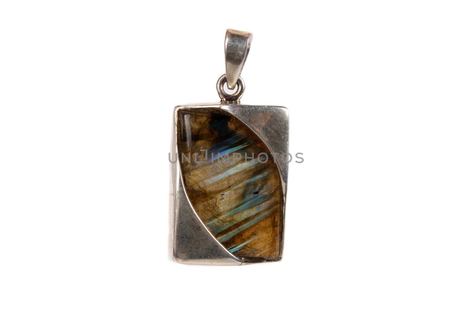 A labradorite pendant made of silver used as jewelery or in alternative therapies like crystal healing and astrology, isolated on white studio background.