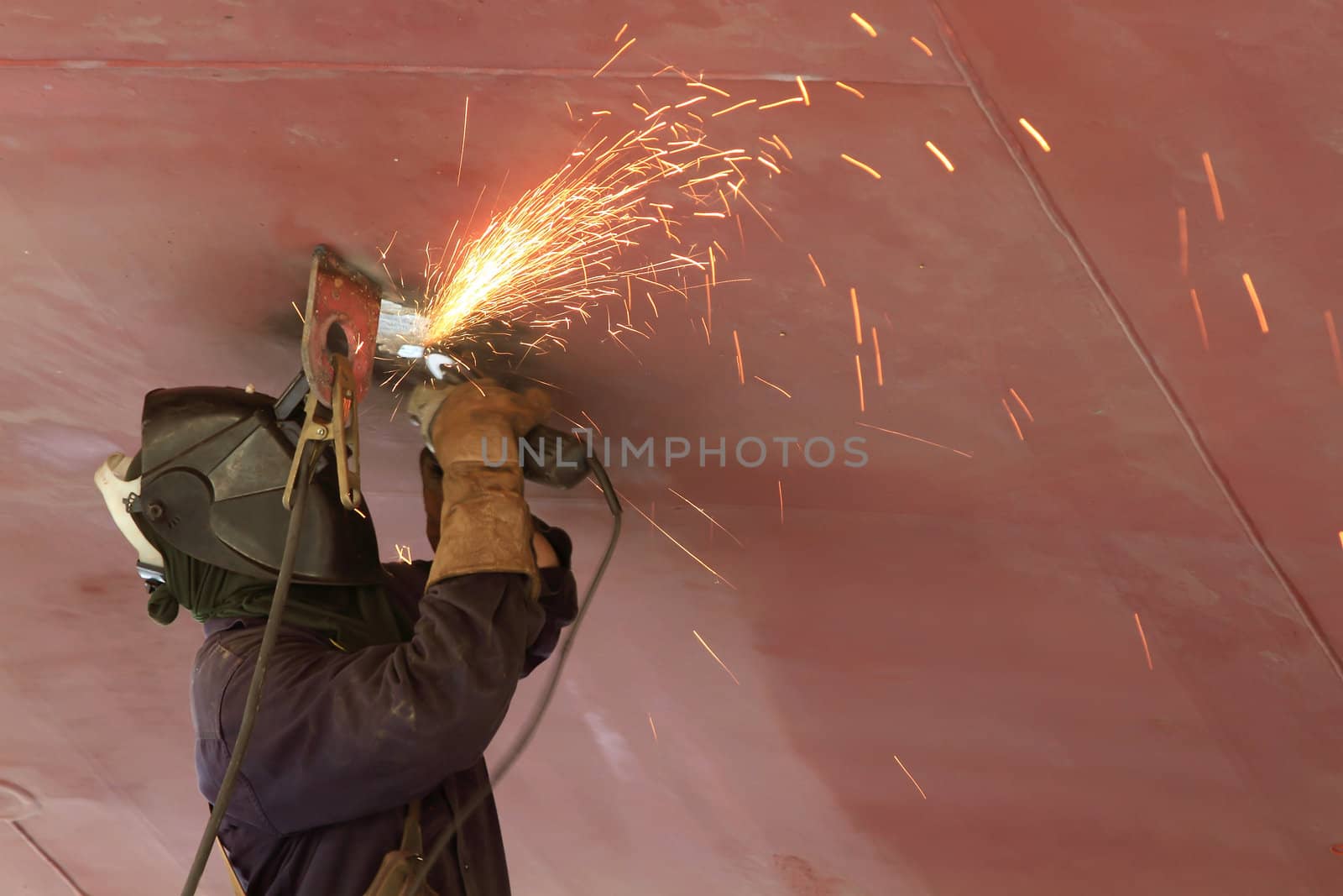 Welder in a factory 
 by rufous