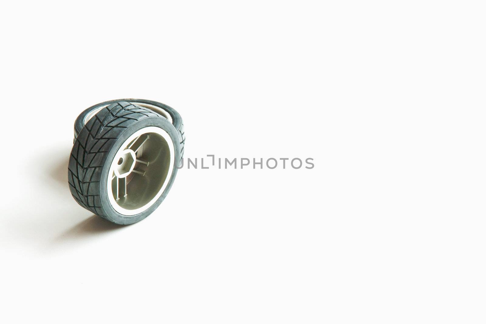 Car wheels on white background. by 9dap