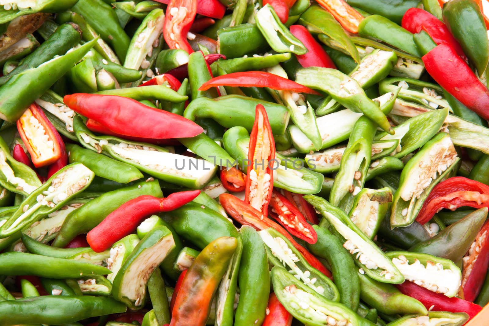 The Red and green slice chili background texture by 9dap