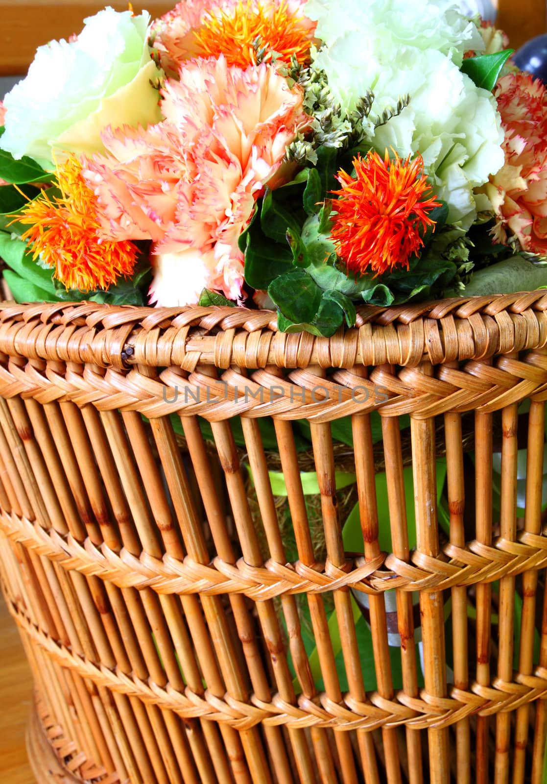 bouquet of flowers in basket 