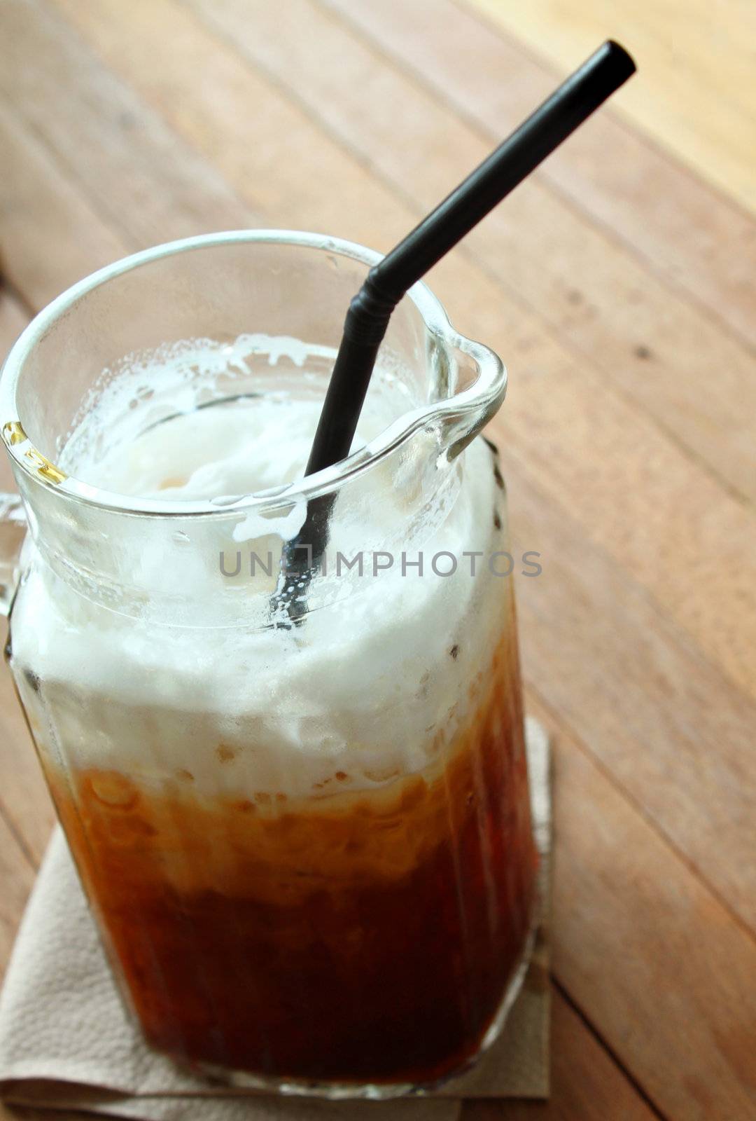 Cold coffee drink on table