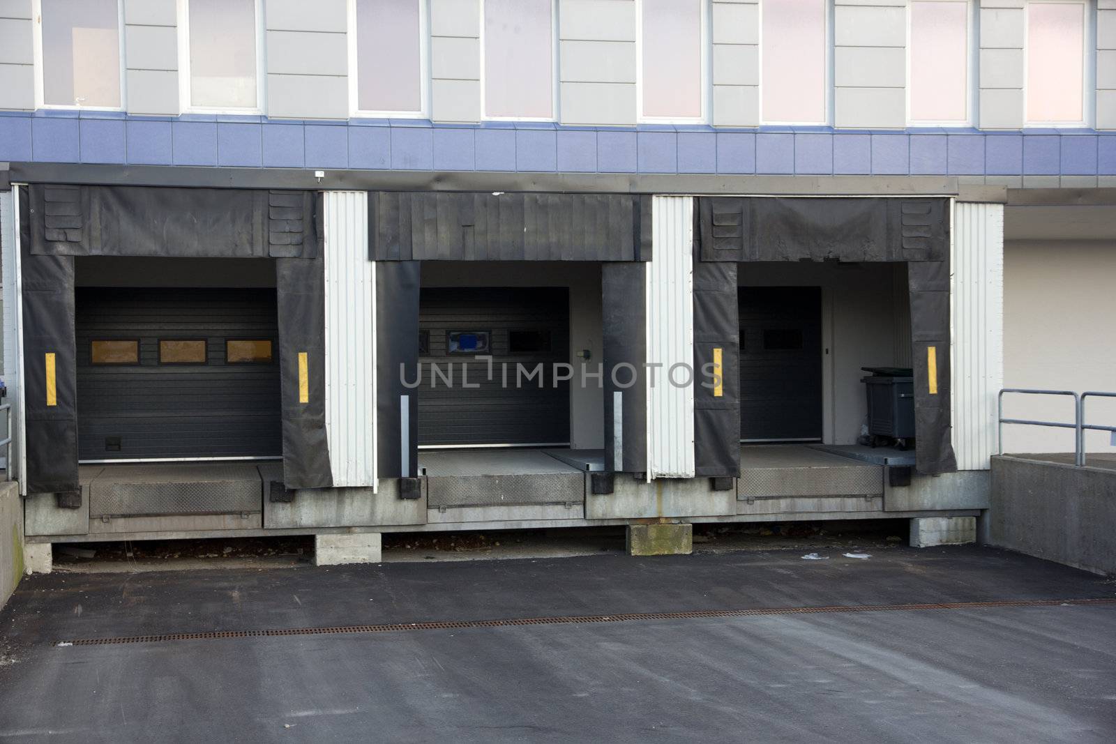 Picture of three loading docks used for trucks to unload goods