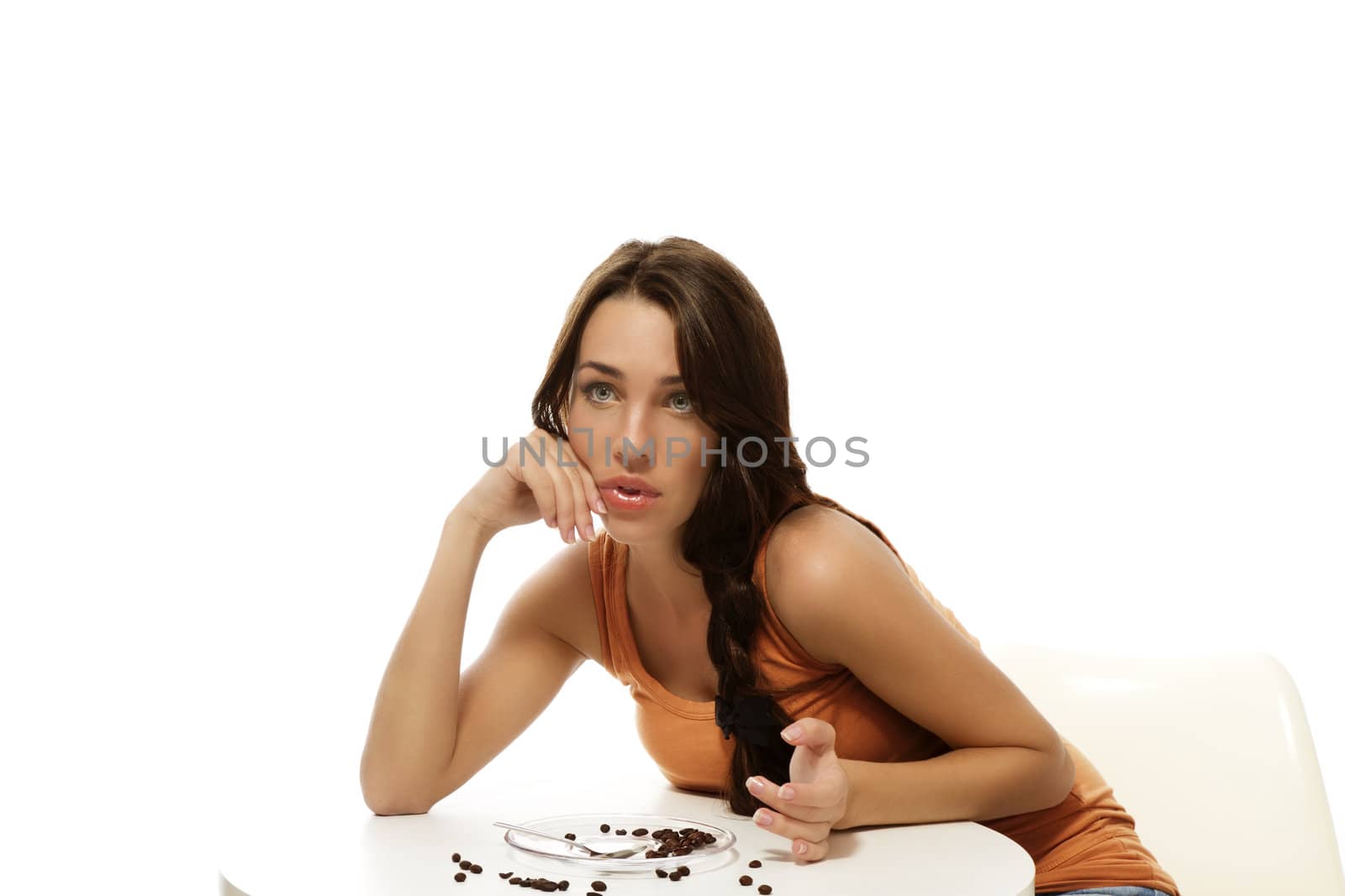 young woman waiting for her coffee on white background