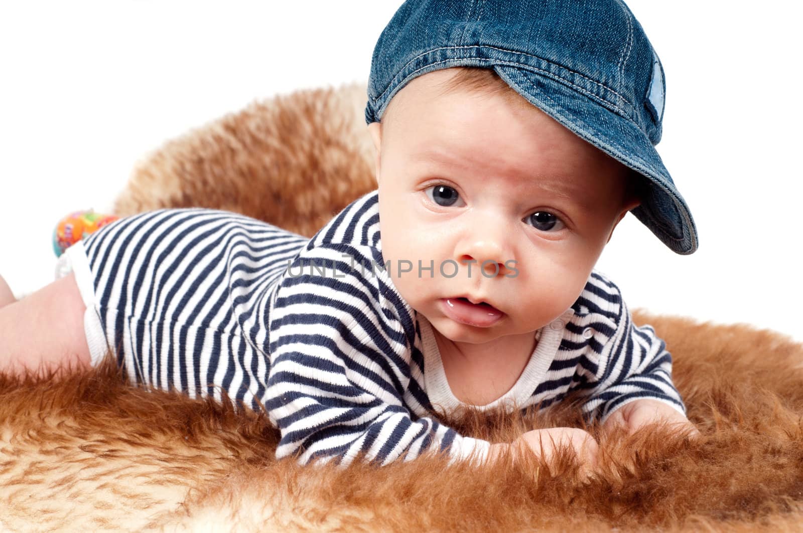 Shot of newborn baby lying on fur