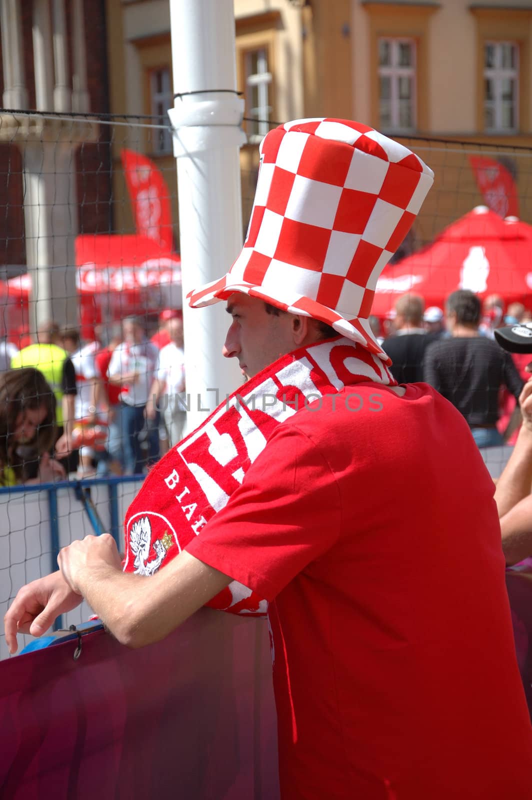 WROCLAW, POLAND - JUNE 8: UEFA Euro 2012, fanzone in Wroclaw. Single Polish fan waiting for first game with Greece on June 8, 2012.