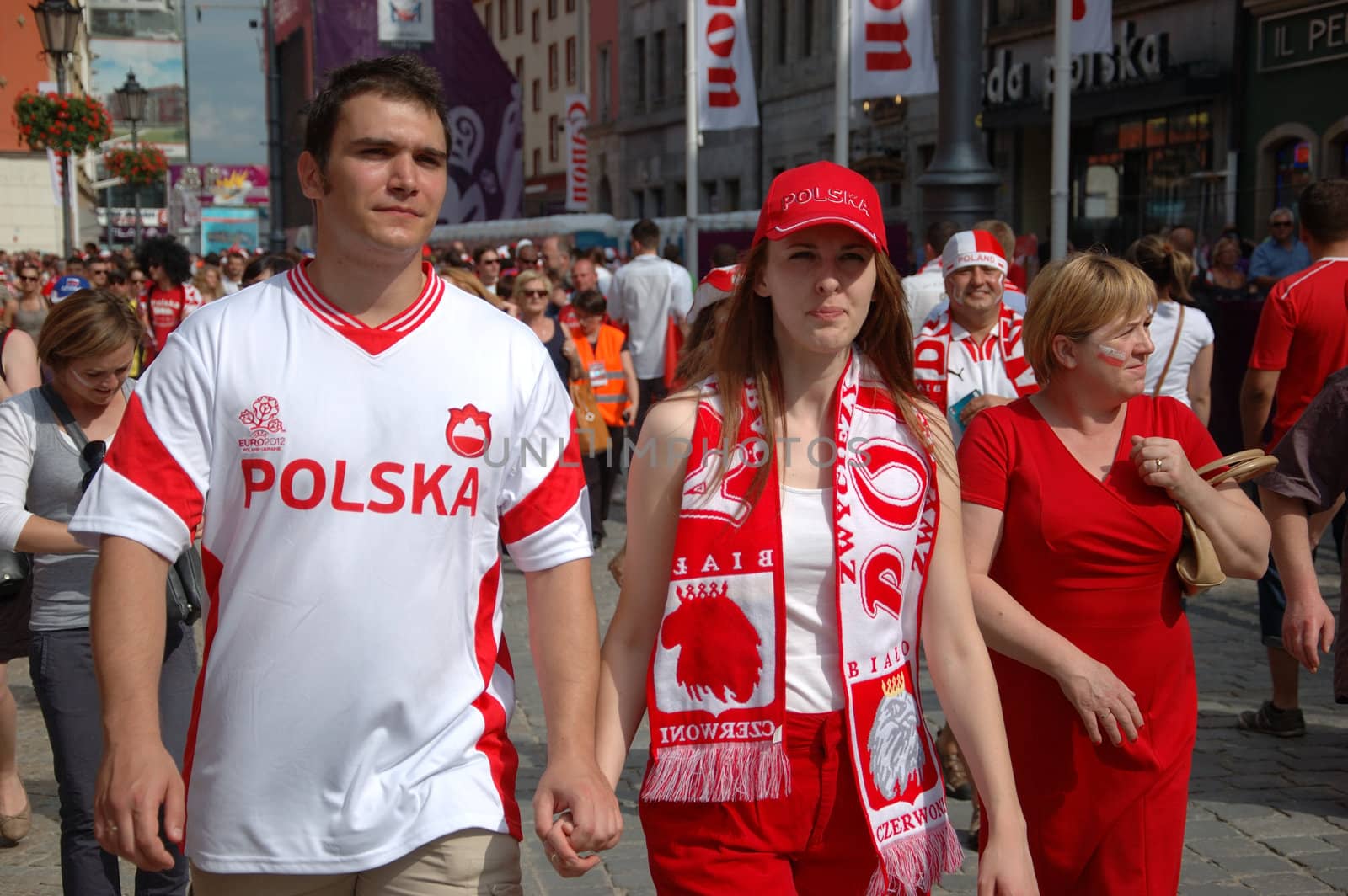 WROCLAW, POLAND - JUNE 8: UEFA Euro 2012, fanzone in Wroclaw. Polish couple visits fanzone on June 8, 2012.